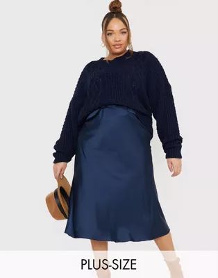 In The Style Plus x Lorna Luxe satin slip midi skirt in navy | ASOS (Global)