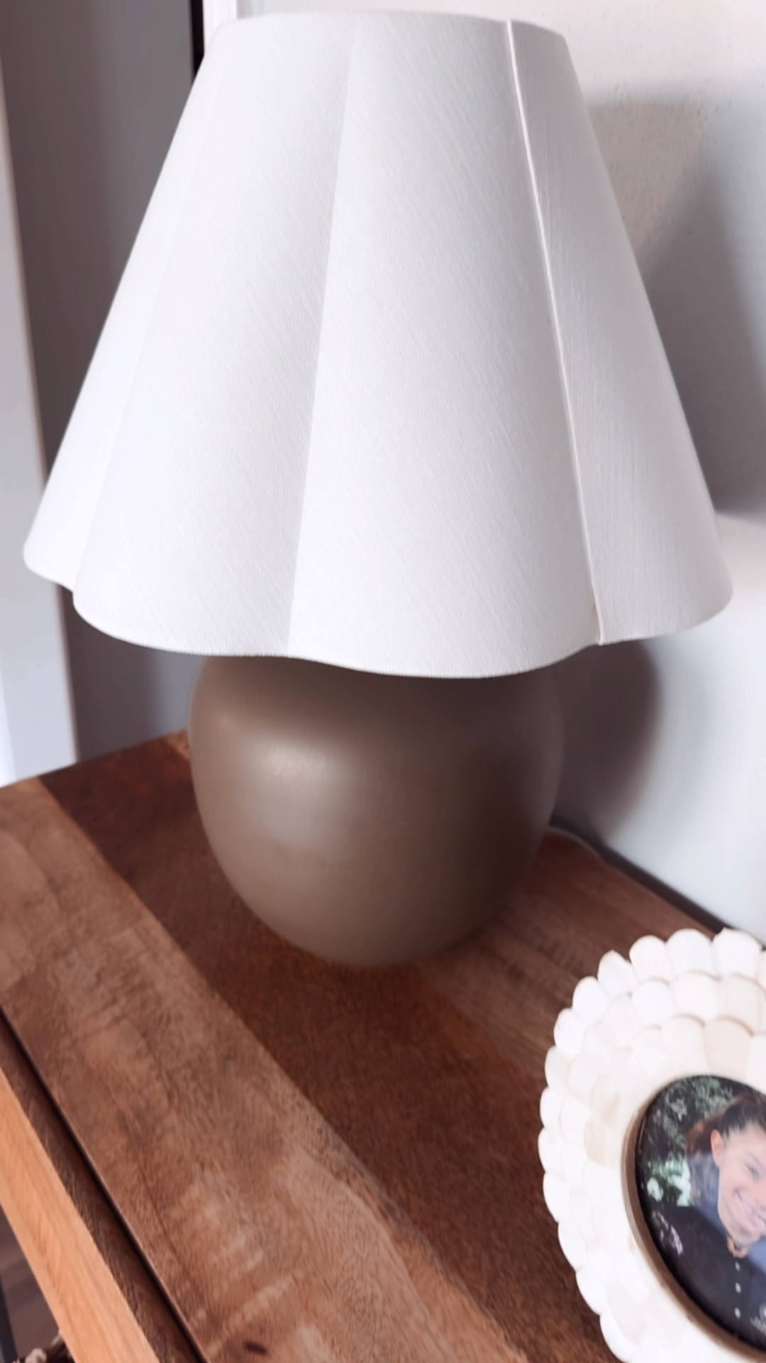 My new fall setup!! Fell for matte olive lamp from Target.  Paired it with the scalloped lamp shade. 

Slowly incorporating some moody decor for fall into my home.  I love how cozy it make the room look. 

#targethome #targetfinds #studiomcgee
Brass sniffer, marble candle tray, ceramic table lamp, scallop lamp shade 

#LTKVideo #LTKHoliday #LTKHome