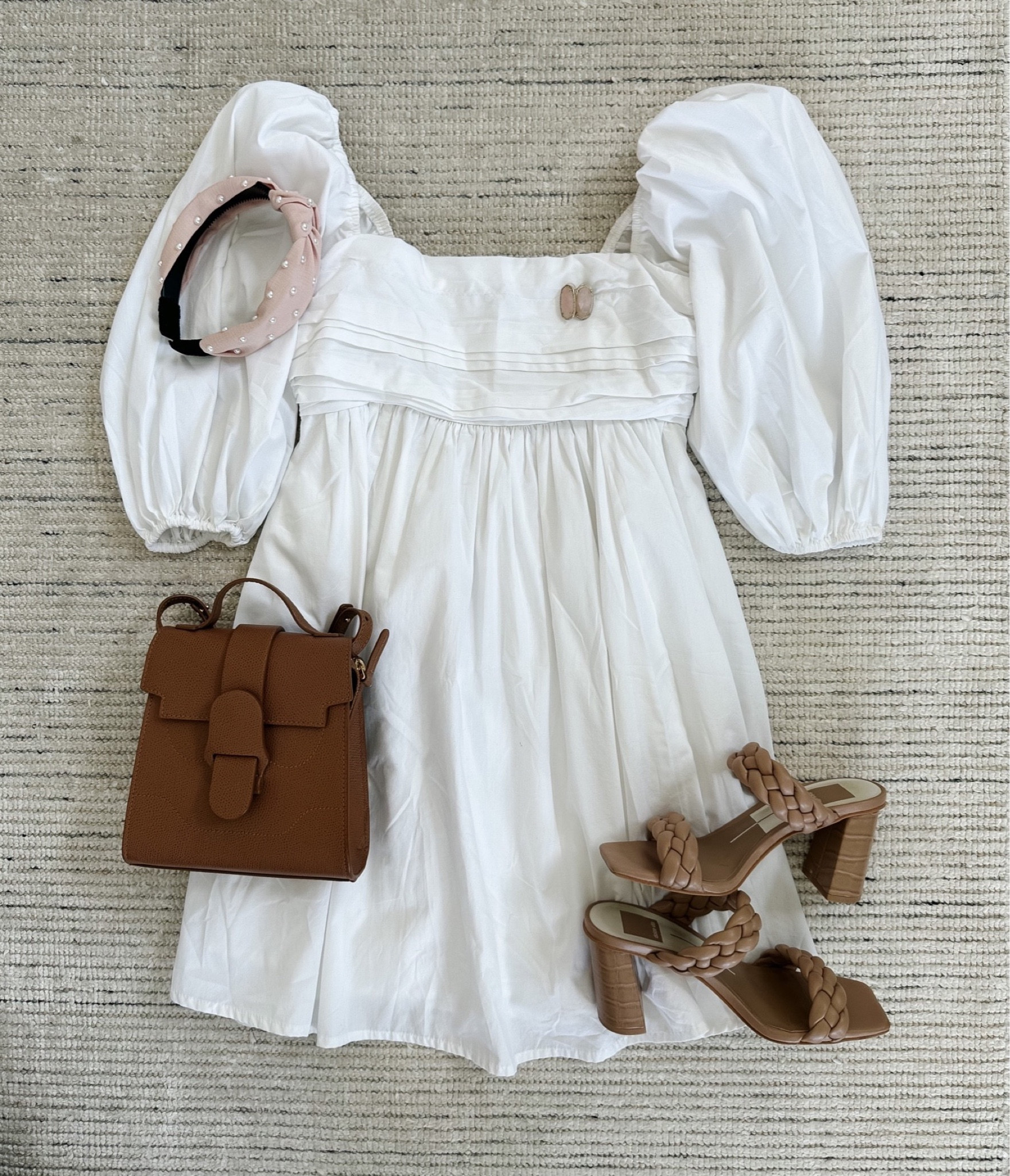 Puff sleeve mini white dress perfect for summer paired with sandals for a classic look! Love the babydoll silhouette on this dress. This dress is great to wear for lunches, date night, casual workwear and bridal showers. Linking very similar dress, my sandals, accessories and more

#LTKSeasonal #LTKstyletip