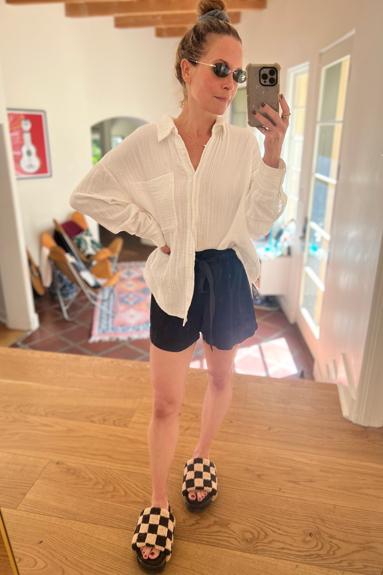 How do you dressssss for over 100 degree days?? 
Comfy, breezy linen button down (it will actually keep you cooler than a tank top! Do a one side tuck). Some billowy shorts and duh cute platform flip flop. My favorite Jenny Bird sunnies. Ready! 🥵

#LTKSeasonal #LTKStyleTip #LTKShoeCrush
