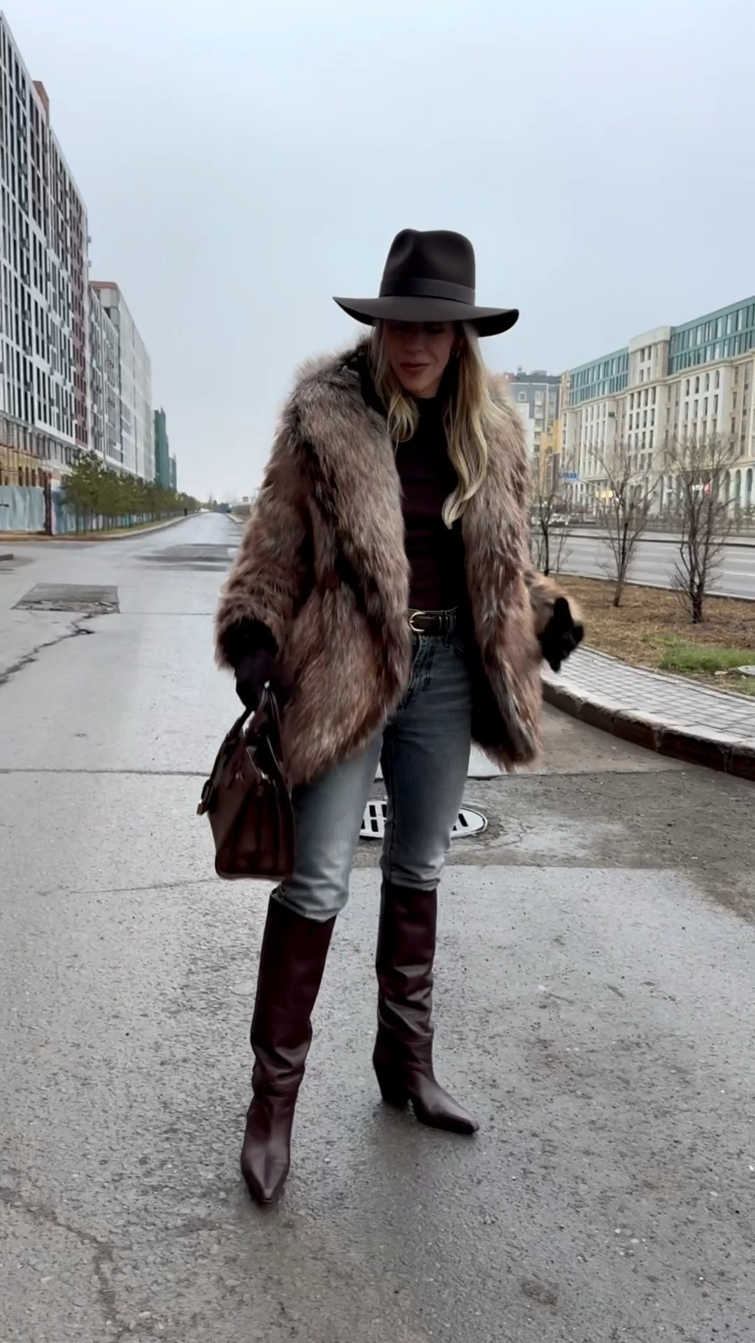Faux fox fur coat, long suede gloves, chocolate brown wool hat, Levi’s slim leg jeans, skinny jeans with tall boots outfit, dark brown knee high boots 

#LTKFindsUnder100 #LTKOver40 #LTKSeasonal