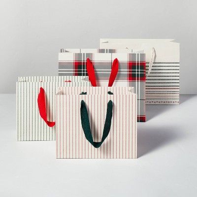 4pk Assorted Holiday Pattern Gift Bags - Hearth &#38; Hand&#8482; with Magnolia | Target
