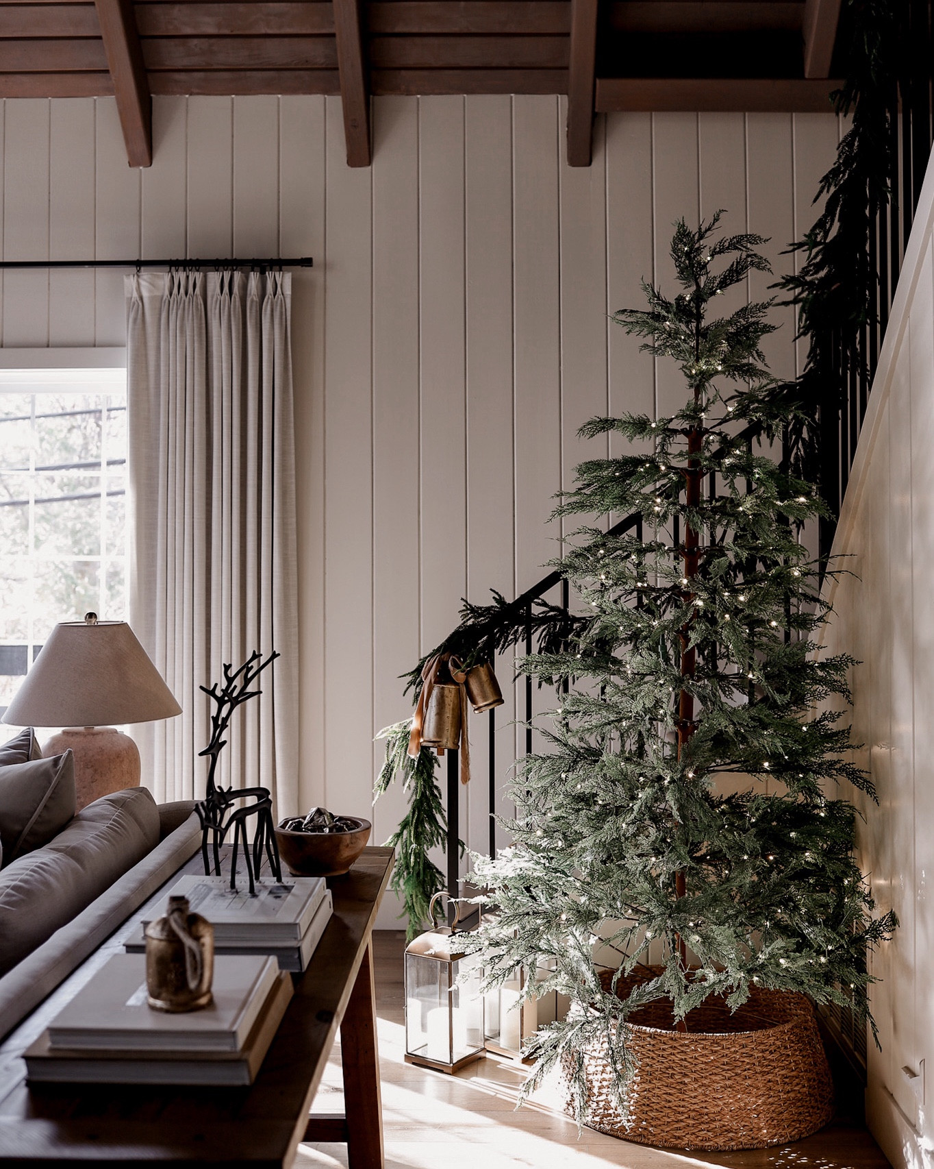 Sharing all the pieces I used to style our staircase for Christmas—garland, Velcro strips, ribbon, twinkle tree, brass bells, and those small details that make it feel warm and magical. Also sharing our Christmas living room details! Everything is linked for quick shopping! 

#LTKHoliday #LTKSeasonal #LTKHome