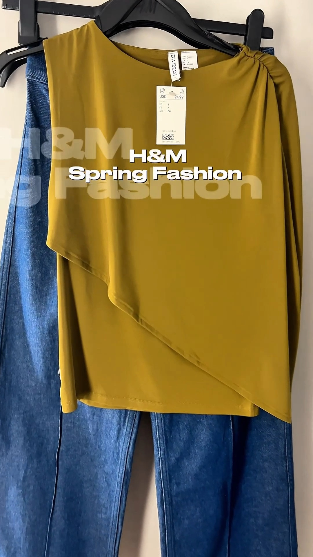 H&M fashion has some stunning colors in their tops like this cape detail and bubble hem top. The wide leg ankle jeans look tailored. They are the most flattering jeans.