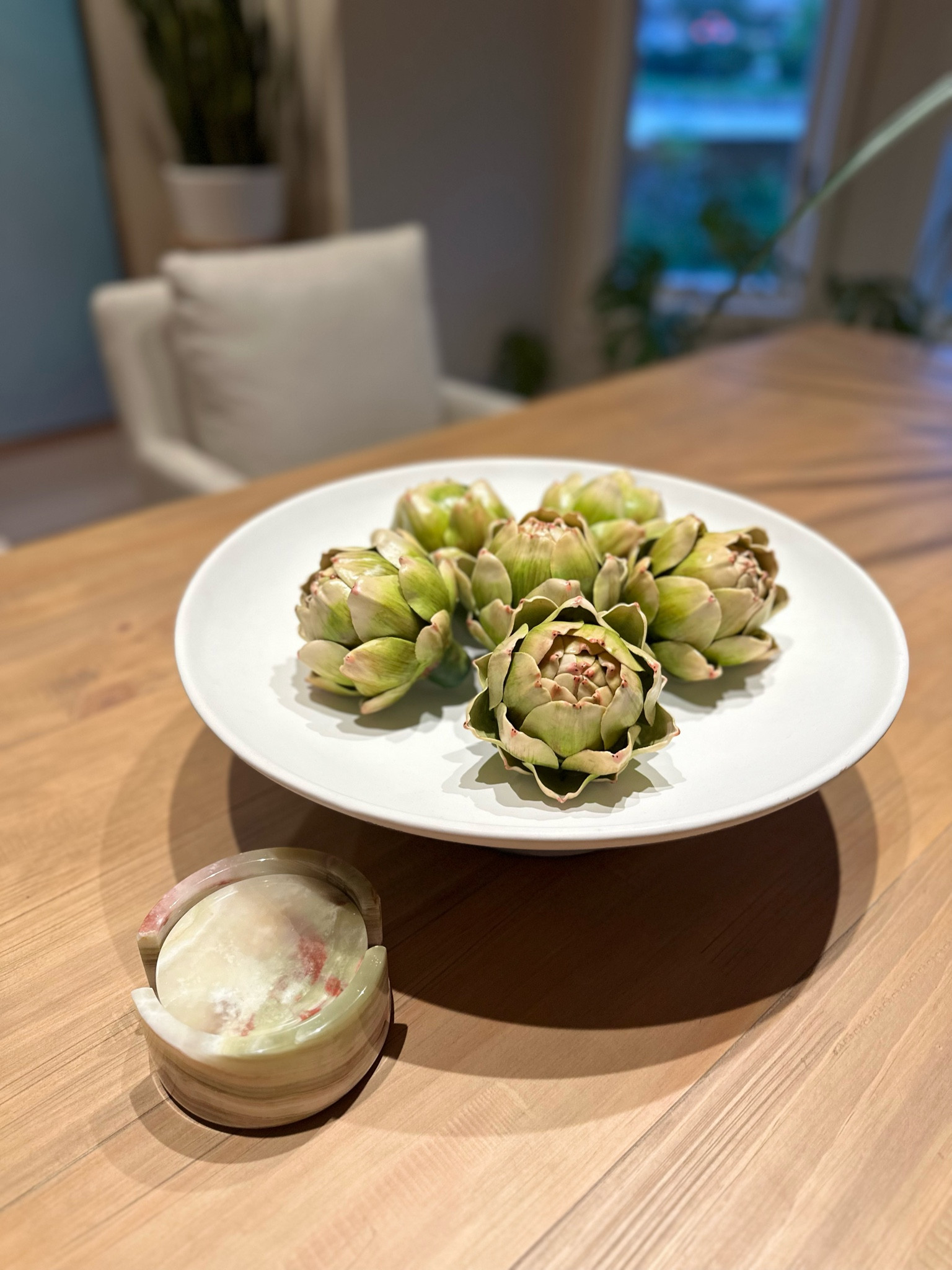 Found these custom coasters up in small town Nederland, CO. I knew they would match perfectly with my artificial artichokes on the dining table but I laugh because we’re not coaster people! I love this West Elm bowl…I’m eyeing it in black, too  

#LTKunder50 #LTKhome