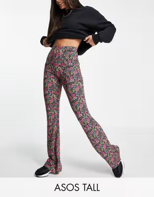 ASOS DESIGN Tall kick flare pants in dark based floral | ASOS (Global)