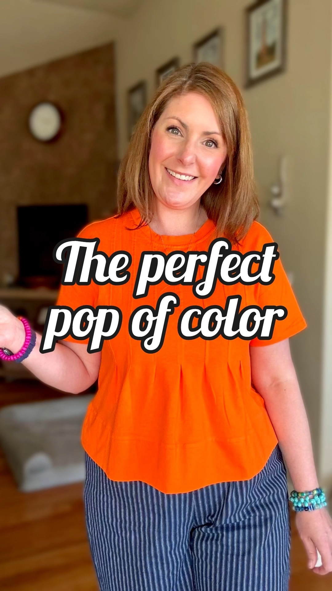 This orange top was exactly what this outfit needed. The pleated detail gives it such a pretty elevated feel, and the slight swing fit makes it easy and comfortable for a full workday. Paired with elastic waist navy pinstripe pants, the bold color contrast made the whole look feel fresh, polished and a little more fun. I love that it’s super affordable and comes in several other colors too, which makes it such an easy piece to grab if you love having versatile tops on repeat. I layered a denim jacket over it for the chilly morning, and it worked so well without taking away from that fun pop of color. Sometimes one affordable, well-fitting top is all it takes to completely change an outfit.