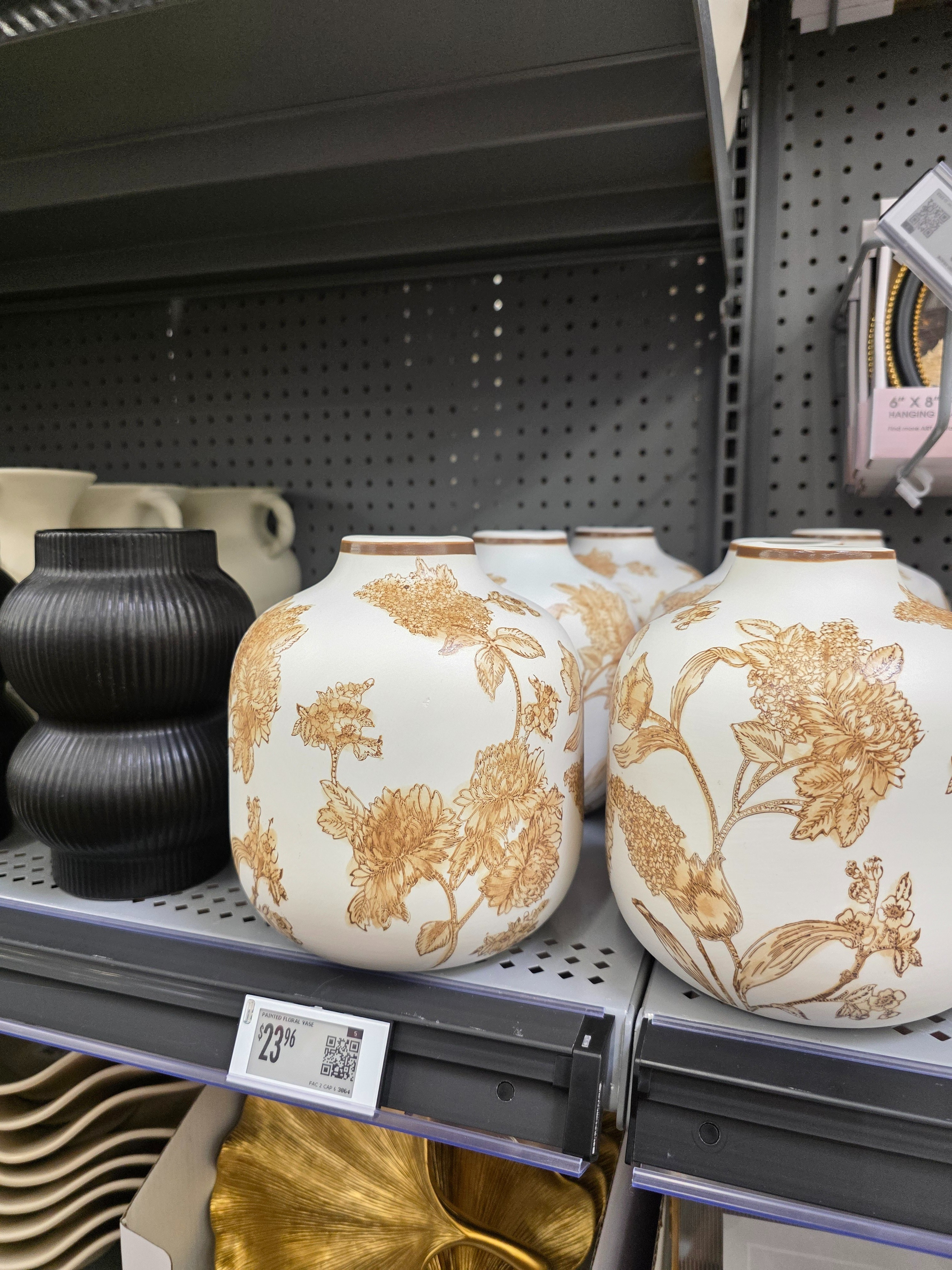The pattern makes it 🤎 A neutral ceramic vase with a soft floral design that adds just enough interest without overwhelming your space. #walmartfinds  

 #LTKHome