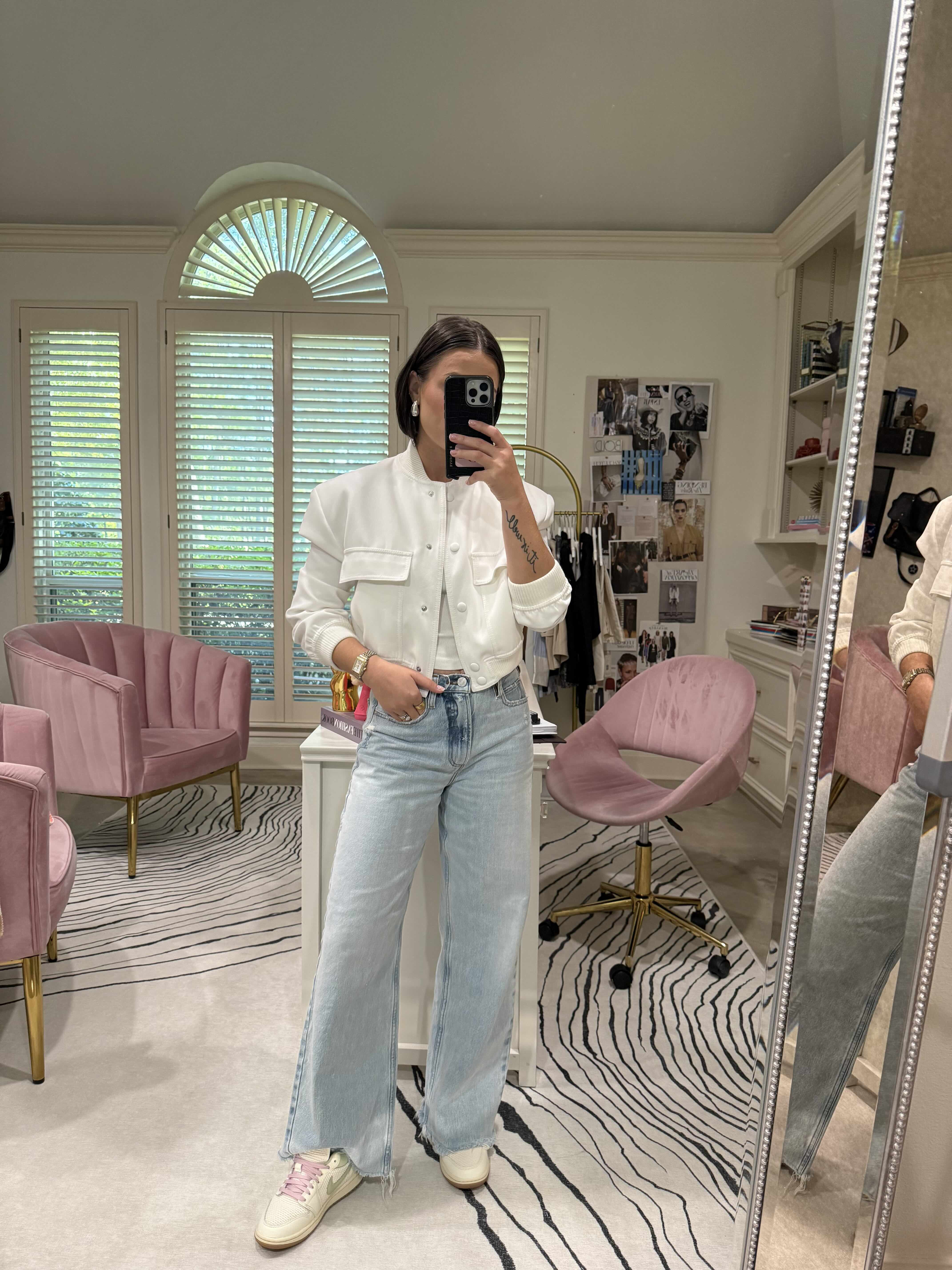 The outfit that happens when you stop overthinking it.
Air Jordan 1 Lows are the sneaker I keep coming back to for the outfits that need to look effortless — and pairing them with the AGOLDE Ren wide-leg crop jean is exactly the proportions that work. High waist, wide leg, clean sneaker at the bottom. The Shona Joy bomber jacket is the layer that pulls it together without adding bulk.
The accessories are doing quiet but important work here — Julie Vos Wave earrings in silver, the Michele Deco Mid diamond dial watch because a good watch is always the right call, and the Bandolier Remi crossbody phone case in black croc because hands-free is non-negotiable when you're actually living your life.
This is the casual outfit that still looks like you have a stylist. Which, for the record, you do. 

 #LTKootd