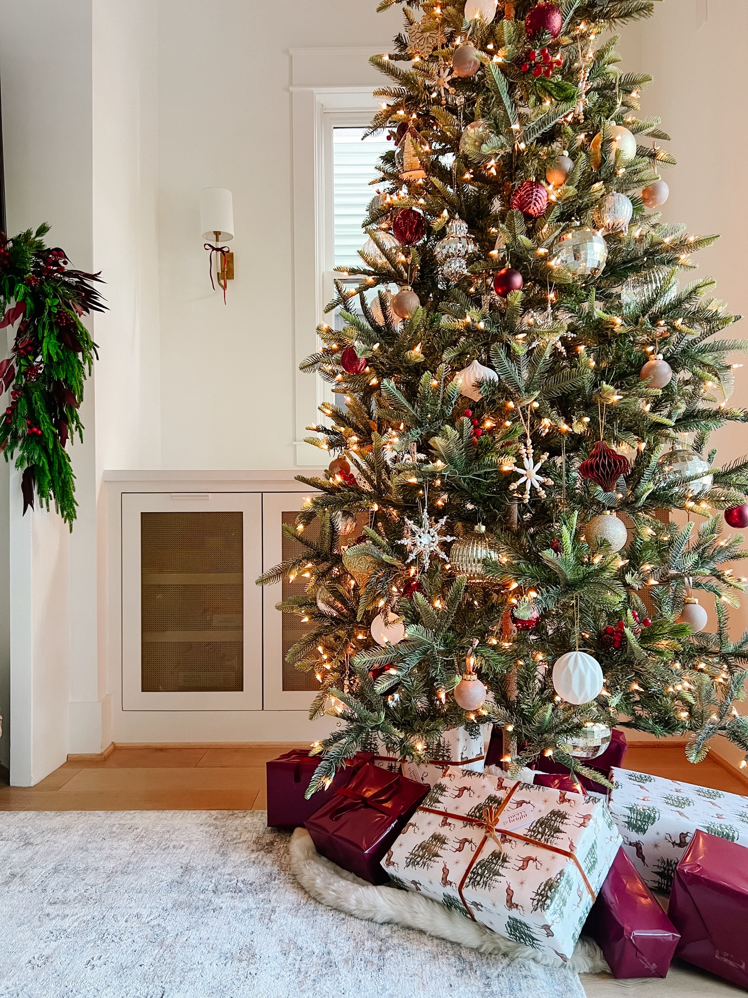 Something so magical about a Christmas tree twinkling in the evening! ✨🎄

We decked ours out with sparkly, metallic and warm berry colors.


#LTKHome #LTKSeasonal #LTKHoliday