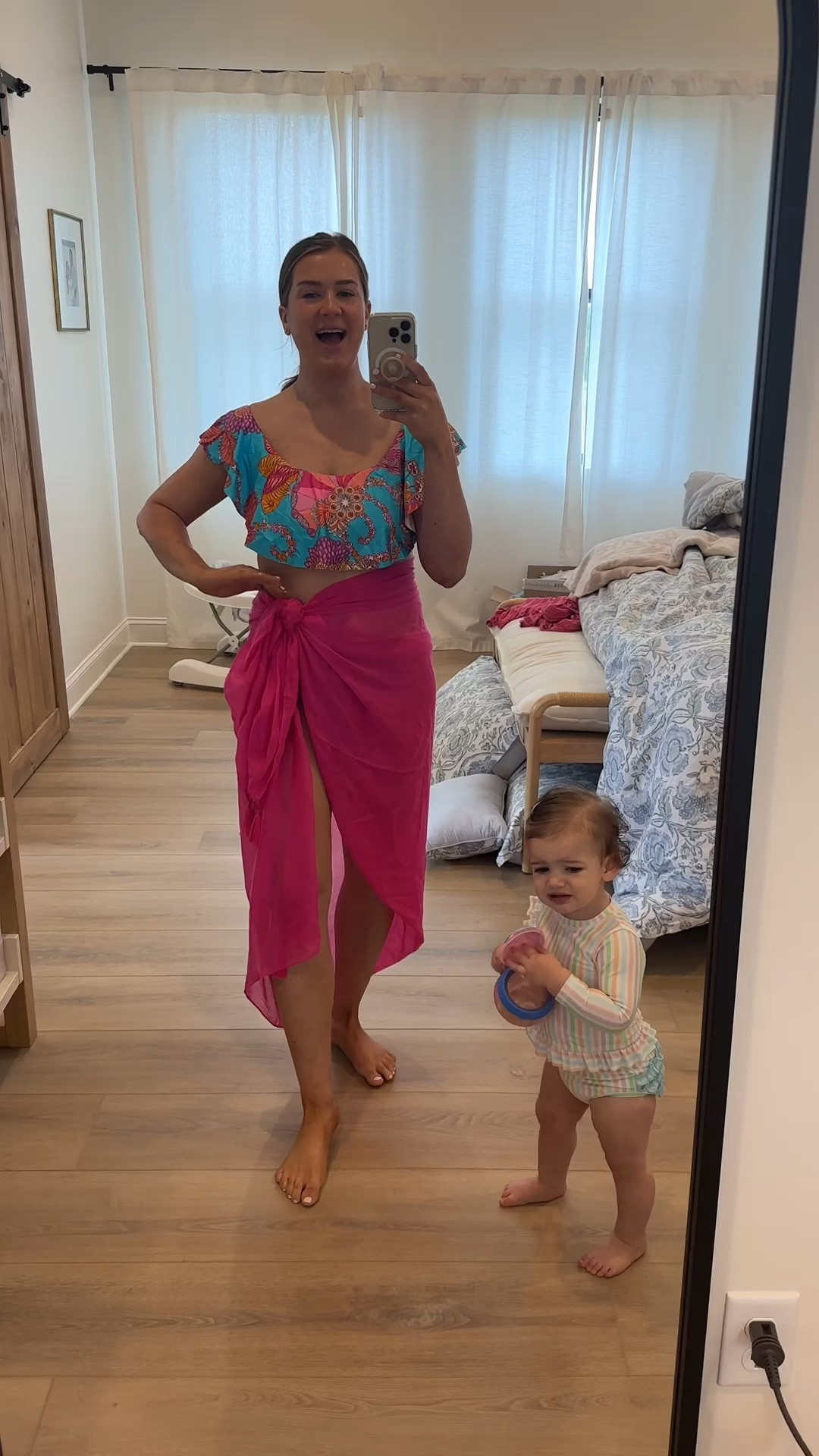 I am wearing a 12 top, and a 10 bottoms. A medium in sarong  