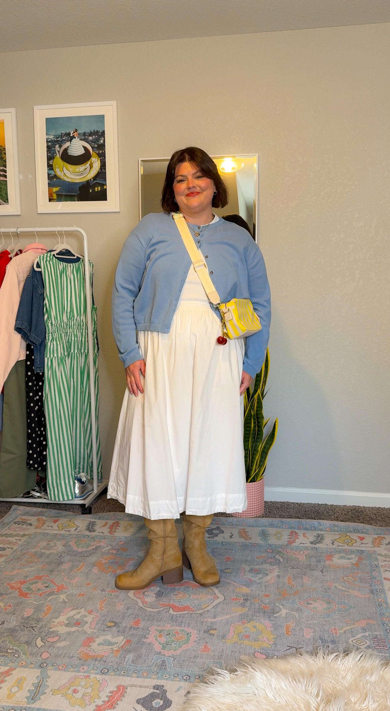 styling a white skirt 5 ways: Date night! 

Boots and a fun cardigan really make a look like this feel elevated but still comfy. I love having a few different bright colored cardigans in my closet for spring outifts! they really go with so much and are a super light layer!  

 #LTKMidsize #LTKPlusSize