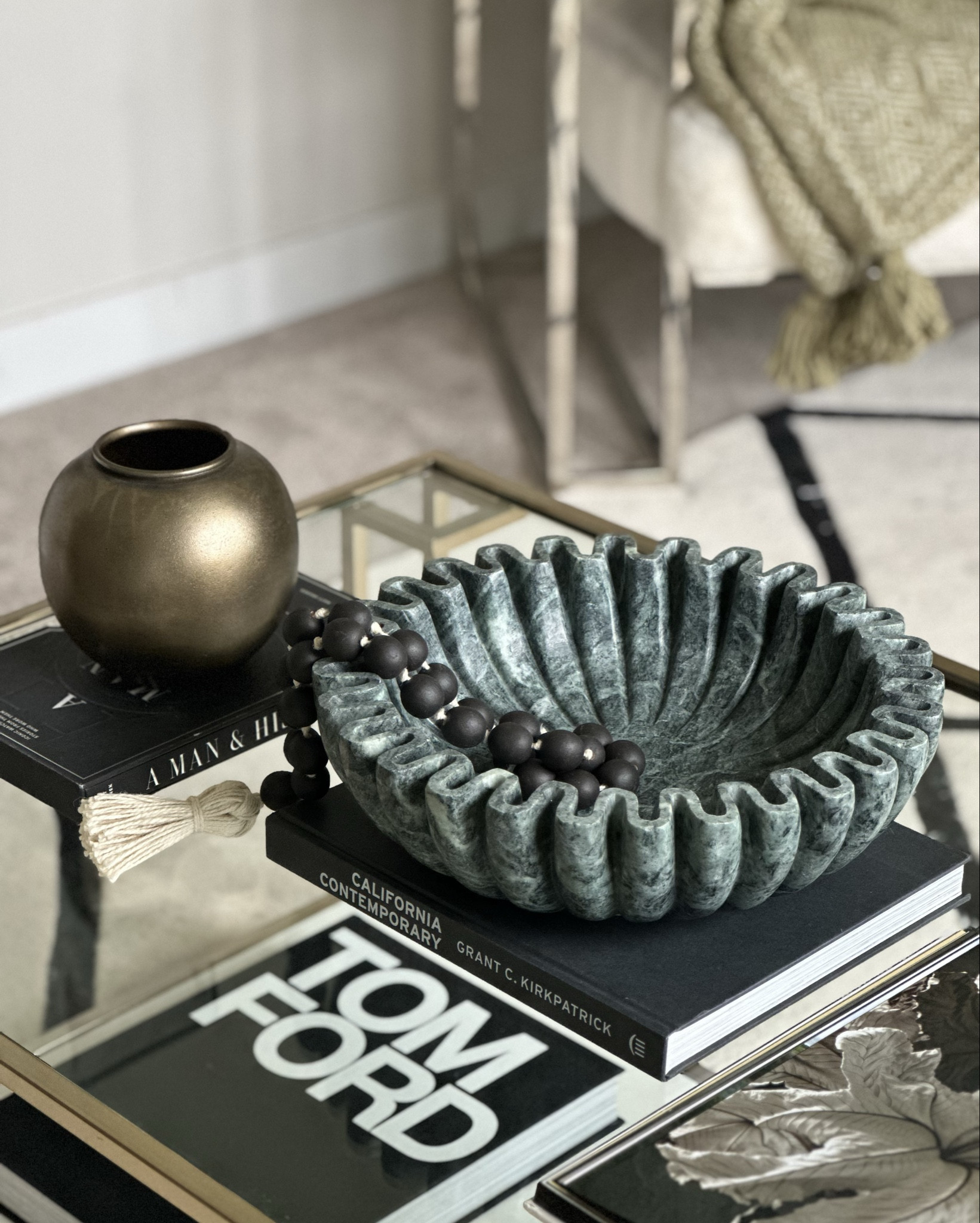 Green sculpture bowl, brass vase, coffee table book

#LTKFindsUnder100 #LTKSeasonal #LTKHome