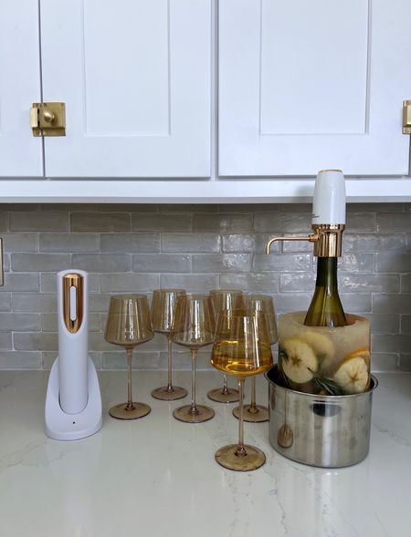 Hosting ideas 
Amber glasses 
Wine opening 
Ice mold 


#LTKHoliday #LTKfindsunder50 #LTKfindsunder100