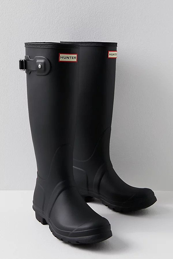 Grandes bottes de pluie à logo tricolore Hunter en Noir, pour femme taille: US 8 chez Free People | Free People FR