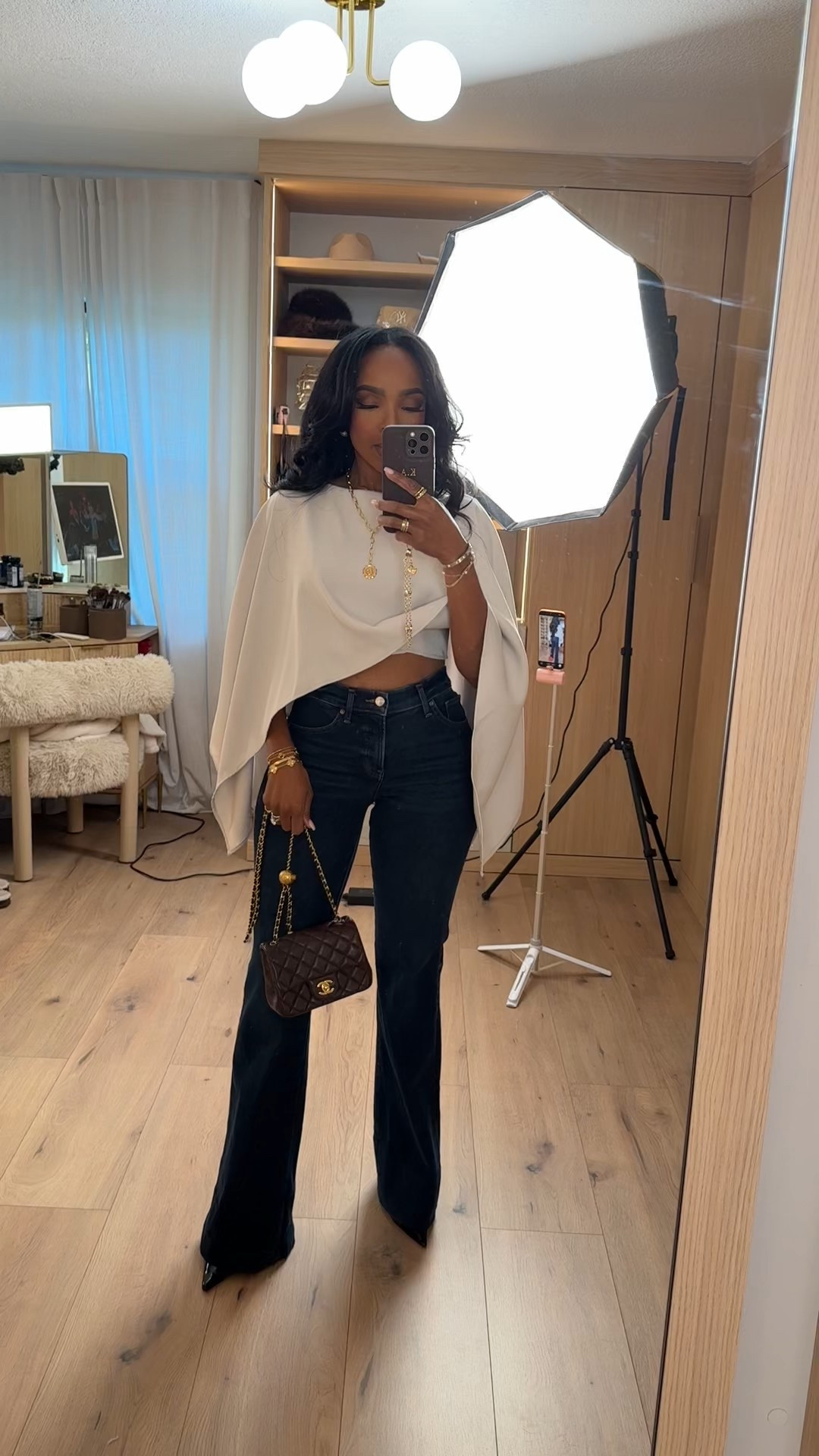 ✨ Effortlessly polished, with a modern edge

This look balances soft movement with a clean, tailored base — the kind of outfit that instantly elevates denim while still feeling easy and wearable. The draped top adds interest without overwhelming, making it perfect for dressing up everyday staples.

Each piece here can be styled multiple ways, so the cost per wear keeps dropping. A great long-term shopping strategy if you’re building a versatile, mix-and-match wardrobe.

Perfect for:
• Dinner plans
• Casual meetings
• Elevated everyday wear

📏 Sizing:
Top — Size Small  
Jeans — 27 Long  
Shoes — True to size  
Bag — One size  

Measurements: 5’4” · 138 lbs · 34D · 27” waist · 40” hips  

Save this post.

Elevated denim outfit, chic neutral styling, modern capsule wardrobe, effortless day to night look, timeless wardrobe staples, feminine minimal style.

Follow me on Instagram and YouTube @kirasfashionfinds

#LTKgrwm #LTKootd