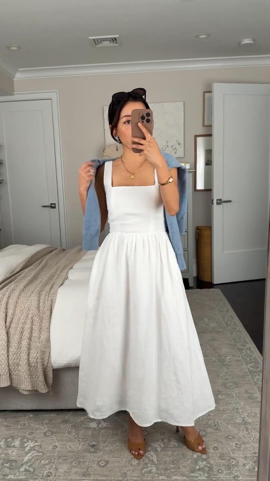 The Gingham print is also so cute!
• Linen fit & flare midi dress - Size XS is TTS so it’s a tad loose on me through the torso, but gently fitted with a petite friendly length I can wear with flats. 

Flattering fit and flare cut, lined, smocked back with adjustable button straps, and pockets.

• Over the shoulders: cashmere sweater xs 

2026 spring summer dress, Europe trip outfit, white linen dress, white petite friendly dress, bridal shower 

#LTKWedding #LTKSeasonal #LTKPetite