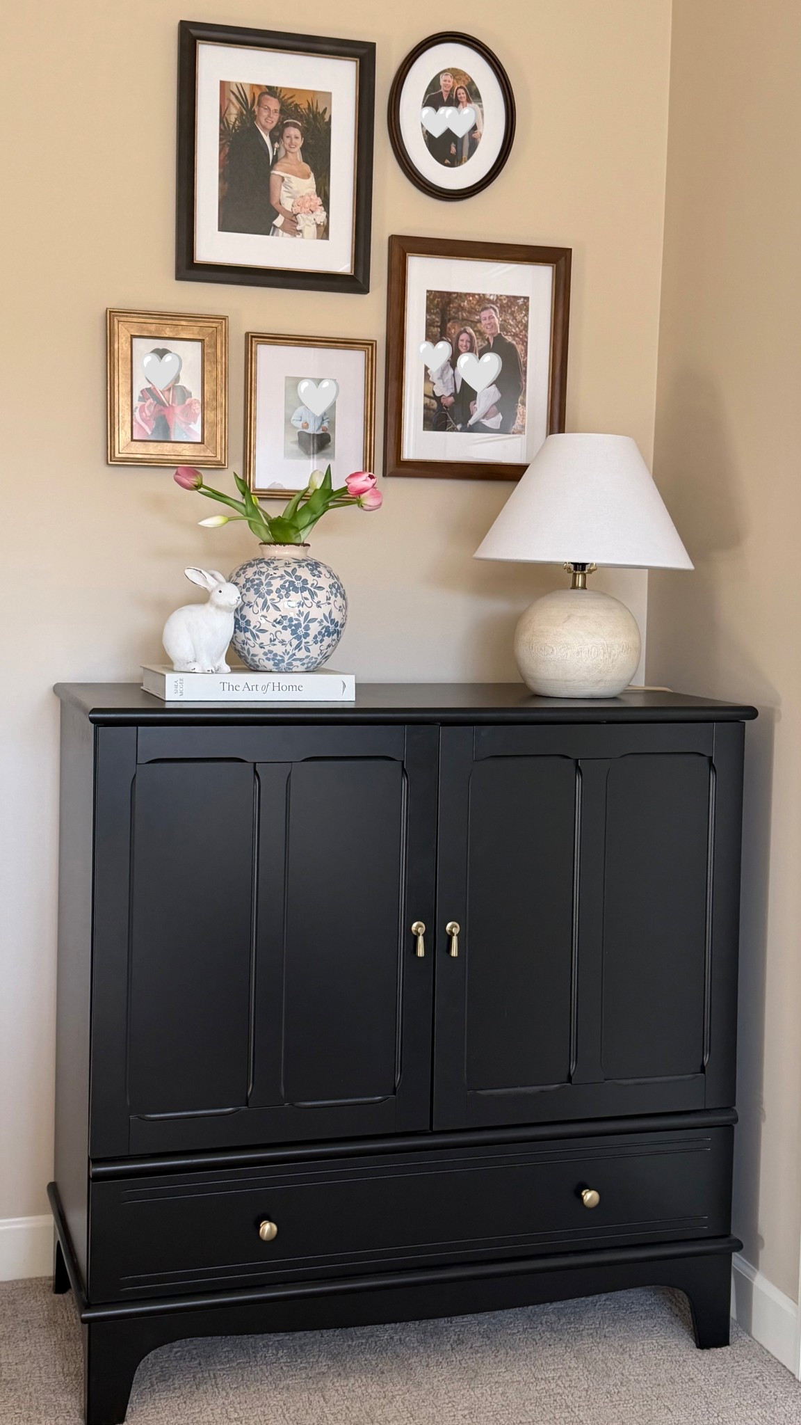 Adding a beautiful cabinet, layered family photos, soft lighting, and a simple seasonal touch turns this space from “just a hallway” into something more meaningful. 

#LTKHome #LTKSeasonal