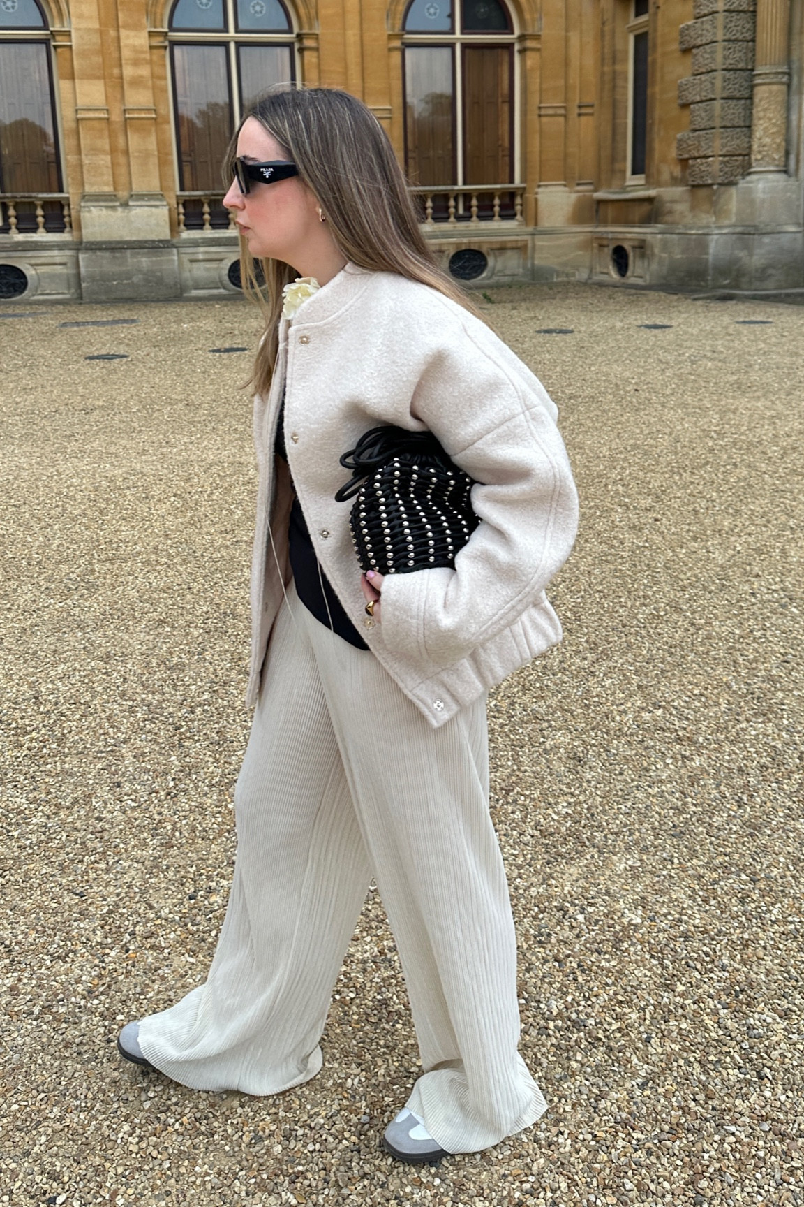 A Sambas outfit idea with some elevated accessories ⚡️
Adidas sambas trainers | It trainers | Gold heart ring | Mejuri Charlotte hoops | Cream plisse wide leg trousers | Borg bomber jacket | Zara bomber dupe | Bandeau top black | 3D rose lariat necklace 

#LTKshoecrush #LTKitbag #LTKstyletip