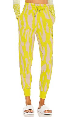 adidas by Stella McCartney ASMC SW Pant in Acid Yellow & Pear from Revolve.com | Revolve Clothing (Global)