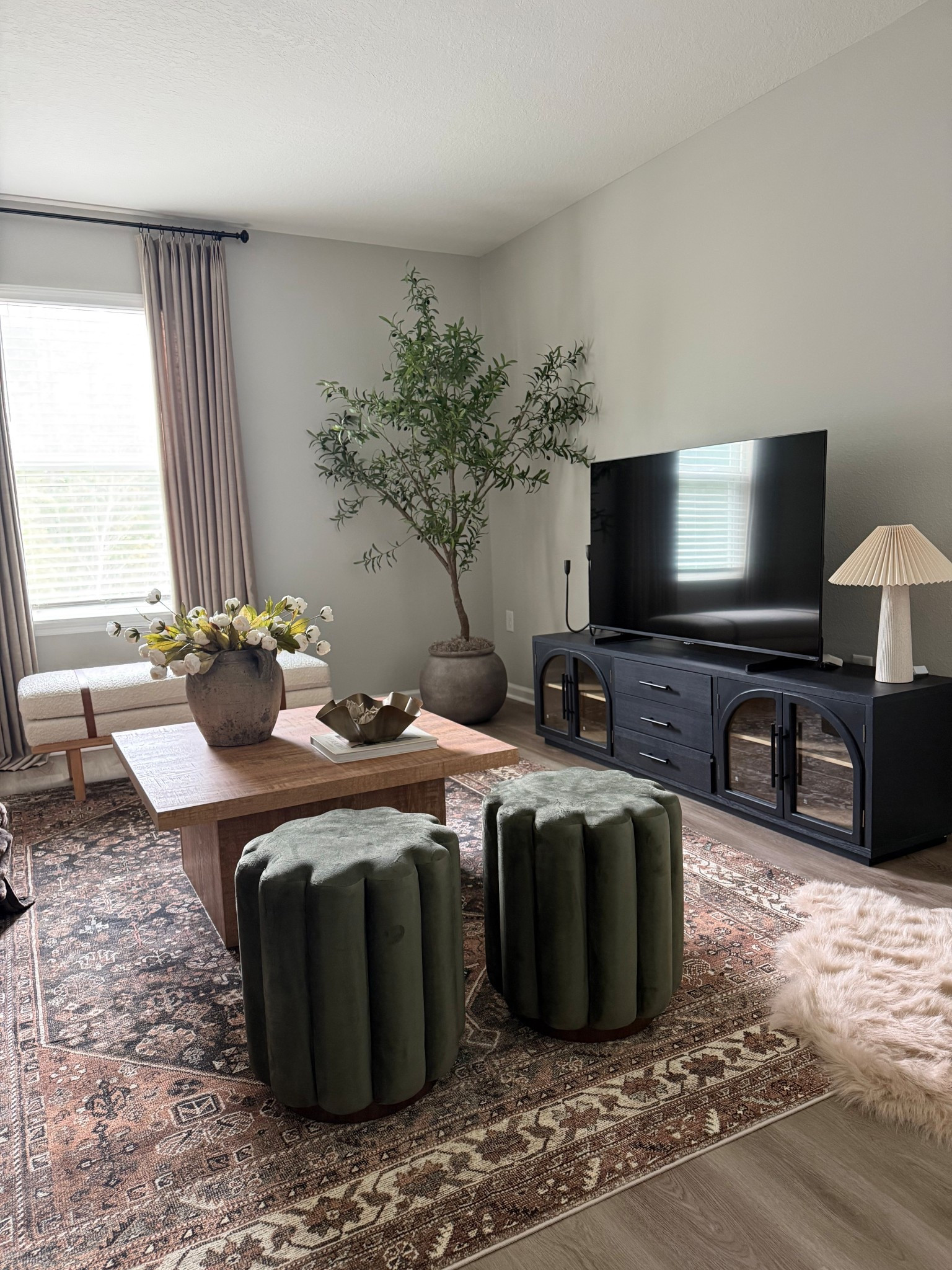 My favorite ottomans now come in this gorgeous green color! Best parta they’re under $70 🙌🏽 

Walmart home finds, green ottomans, spring decor, small ottomans, coffee table, tv stand, moody loft inspo, vintage inspired rug, living room inspo, faux olive tree, designer inspired home finds 

#LTKHome #LTKSaleAlert #LTKSeasonal