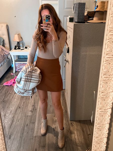 Another day; another skirt! 

The weather is back above 60°, so I decided to piece together some neutral browns as todays fit. 

Everything runs true to size, but the skirt would need to be sized up if you have those gorgeous hips we all want and admire! 

These booties are my latest find and I’m obsessed to say the least! Highly recommend! 



#LTKSeasonal #LTKunder50 #LTKstyletip