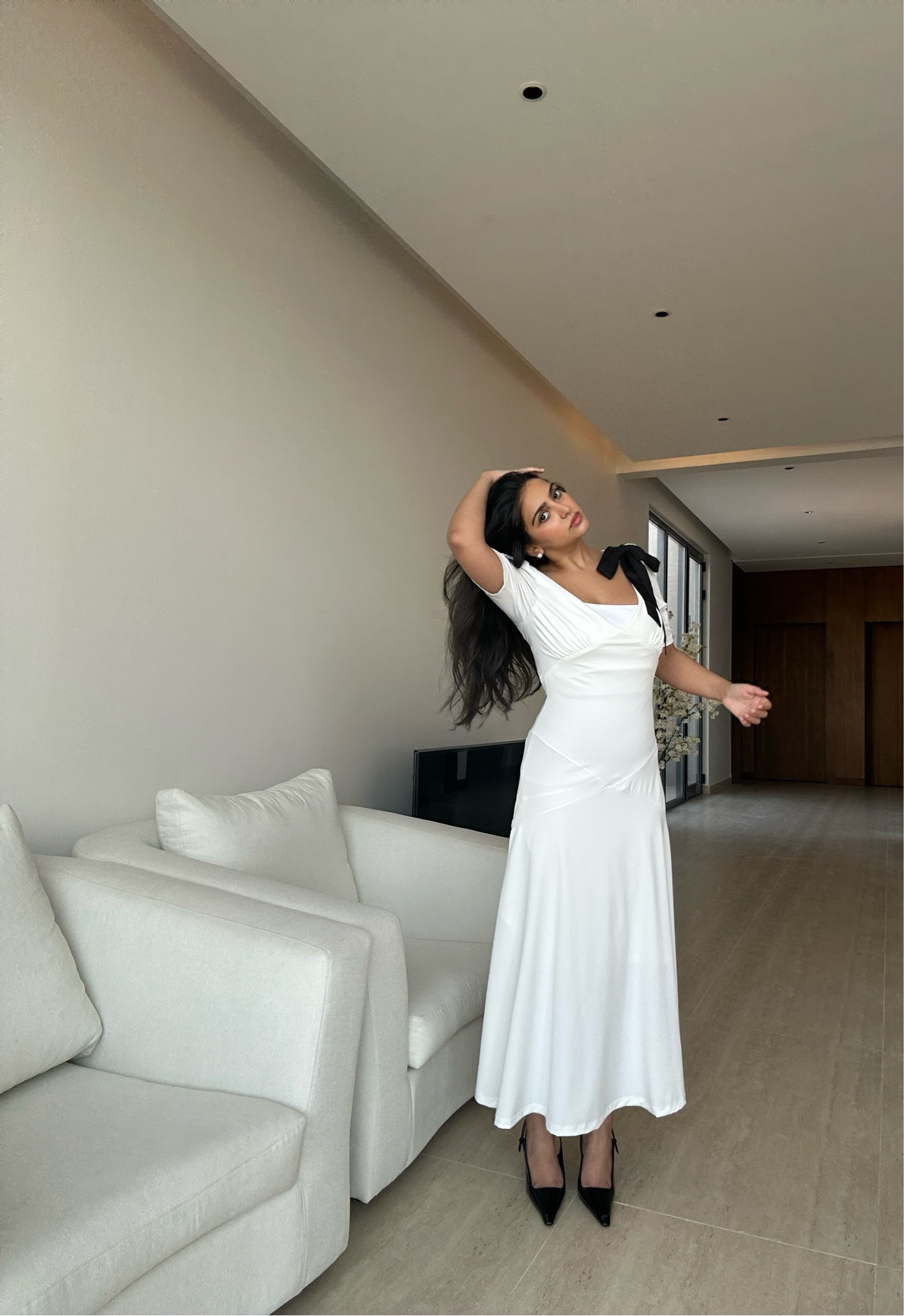 White dress with black bows 