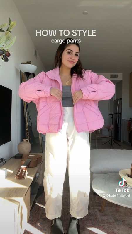 How I style cargo pants 💓 If you’re looking for a good pair of cargo pants, this pair from Free People movement is one of my favorites! Really comfy and they really move with you. Paired them with my favorite packable jacket, which is also FP movement, a long sleeve T-shirt from Abercrombie, and doc marten mules! 

Sizing: 
Pants - M (true size) 
Jacket - M (true size)
Mules - 7 (normally 7.5)
Top - M

#LTKSeasonal #LTKfindsunder100 #LTKfindsunder50