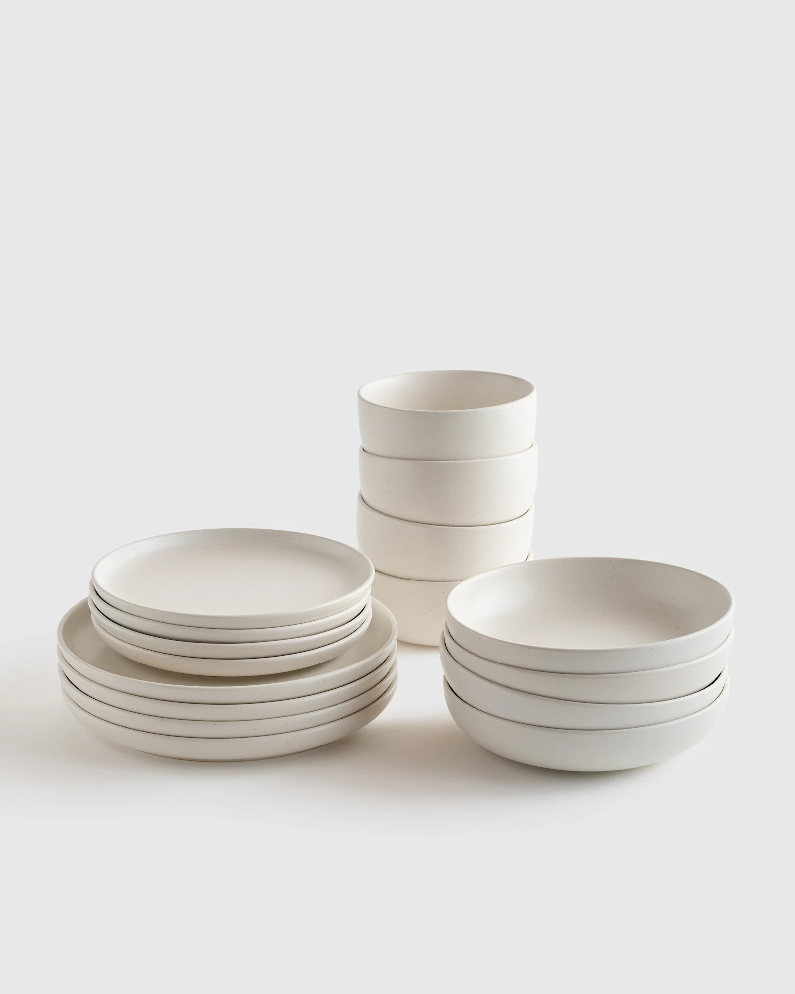 Quince | Matte Coupe Stoneware 16-Piece Dinnerware Set in Speckled White | Quince