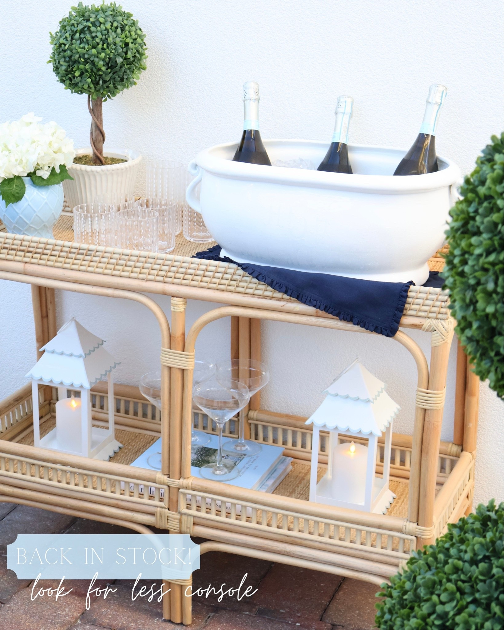 The rattan console table that doubles as the prettiest bar cart ✨🤍 now back in stock & on sale!

This is such a good look for less if you've had your eye on the similar designer version. I styled mine with entertaining essentials and (temporarily) brought out on our patio while hosting Al Fresco this Summer! Would be a great as an entryway table, dining room console, living room sofa table or even a coastal inspired buffet.

Rattan Furniture • Amazon Finds • Amazon Home Finds • Bali & Pari • Coastal Home • Bar Cart • Console Table

#LTKHome #LTKSaleAlert