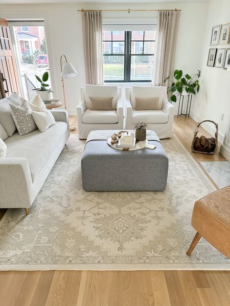 Living room, rug, neutral decor, beige rug, cream rug, white accent chair, leather accent chair, ottoman, throw pillows 

#LTKFind #LTKeurope #LTKstyletip