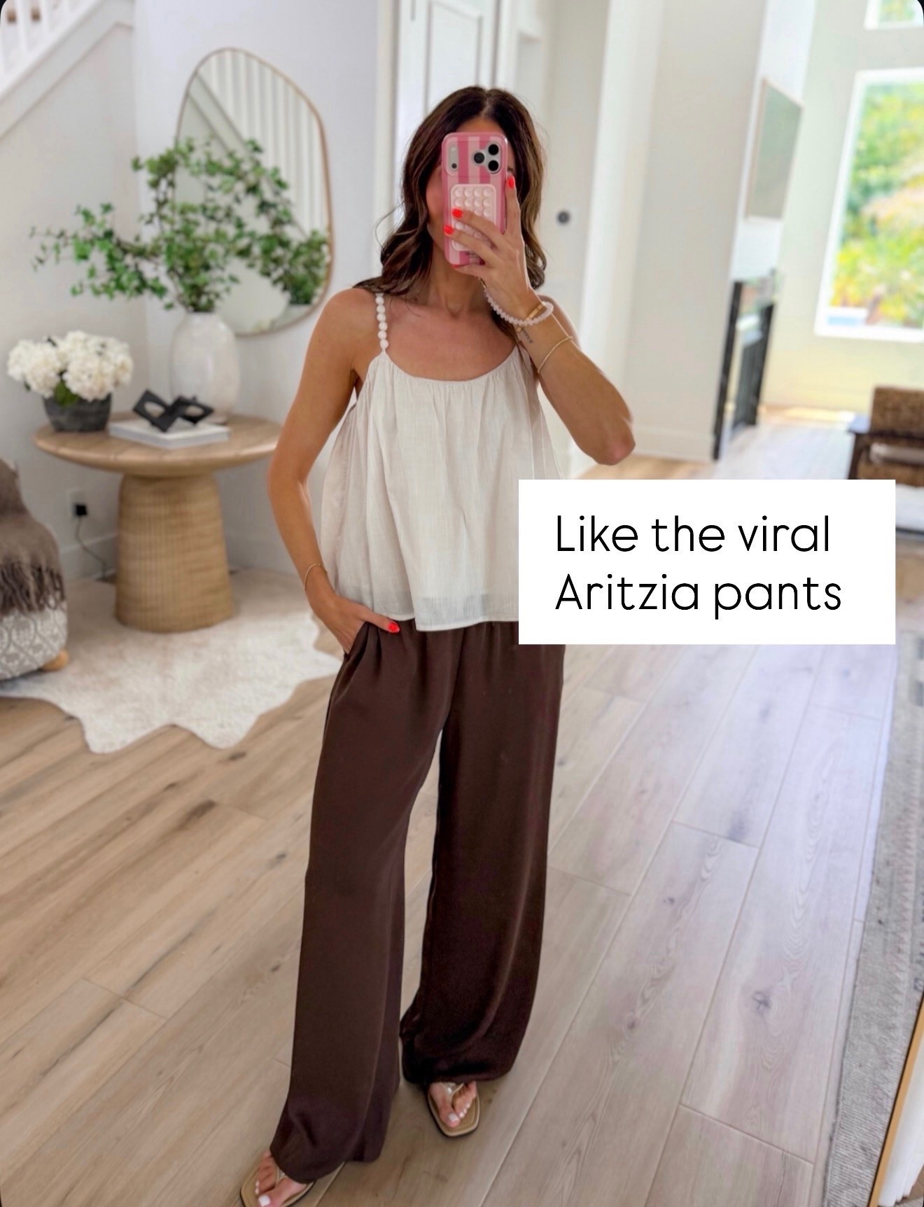 These pants give you that relaxed, drapey look everyone loves without feeling sloppy. The chocolate brown is such a good transition color, and the wide leg falls beautifully with a simple tank and sandals.

brown pants, wide leg pants, relaxed trousers, fall transition outfit, casual pants, neutral outfit, everyday style, drapey pants, summer to fall fashion, annabrstyle

#LTKootd #LTKOver40 #LTKSeasonal