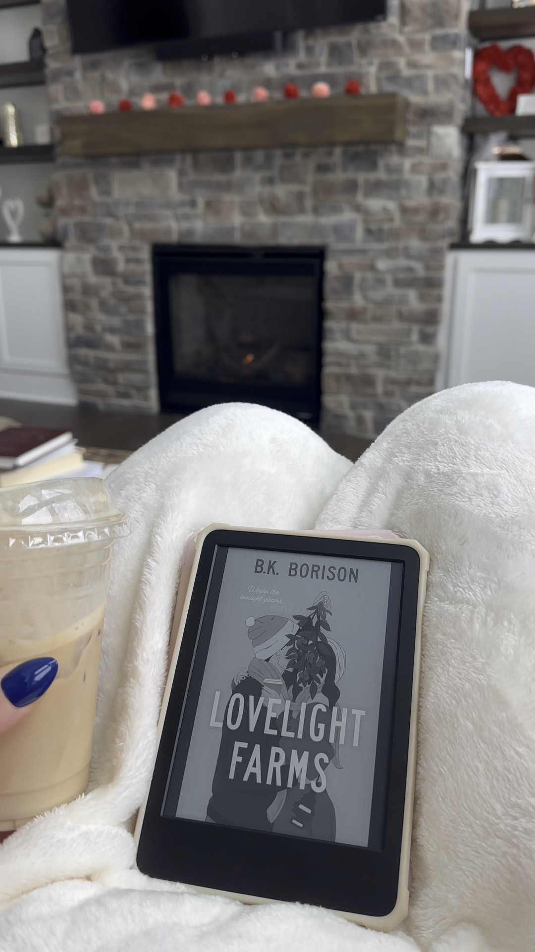 Perfect cozy morning watching the snow with my current winter read by the fire ❄️🙌🏼

#LTKHome #LTKSeasonal