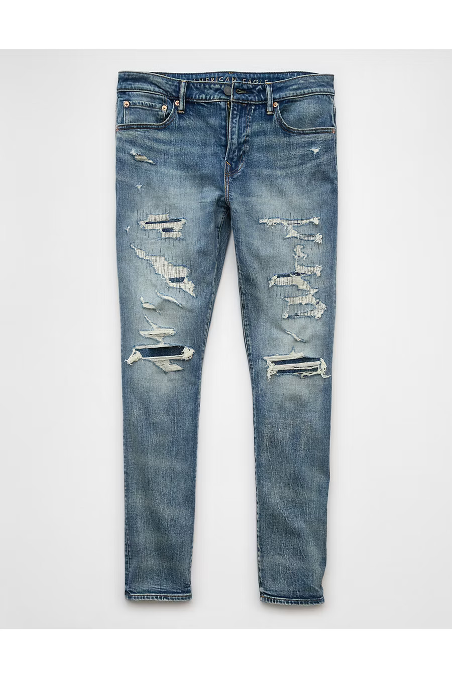 AE AirFlex Patched Athletic Skinny Jean Men's Marbled Blue 26 X 30 | American Eagle Outfitters (US & CA)