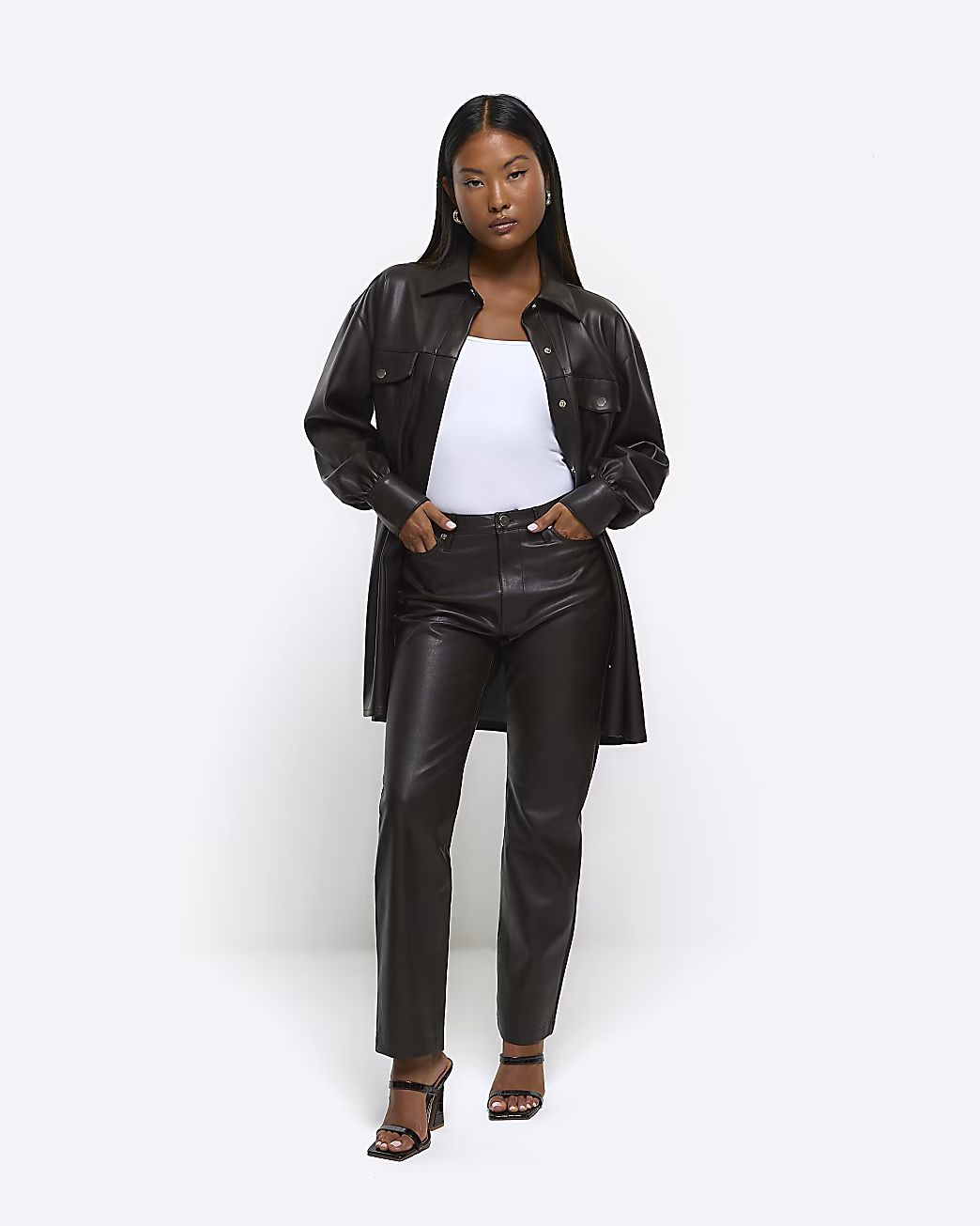Petite brown faux leather straight trousers | River Island (UK & IE)