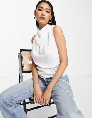 ASOS DESIGN cowl neck sleeveless blouse with skinny tie waist detail in ivory | ASOS (Global)