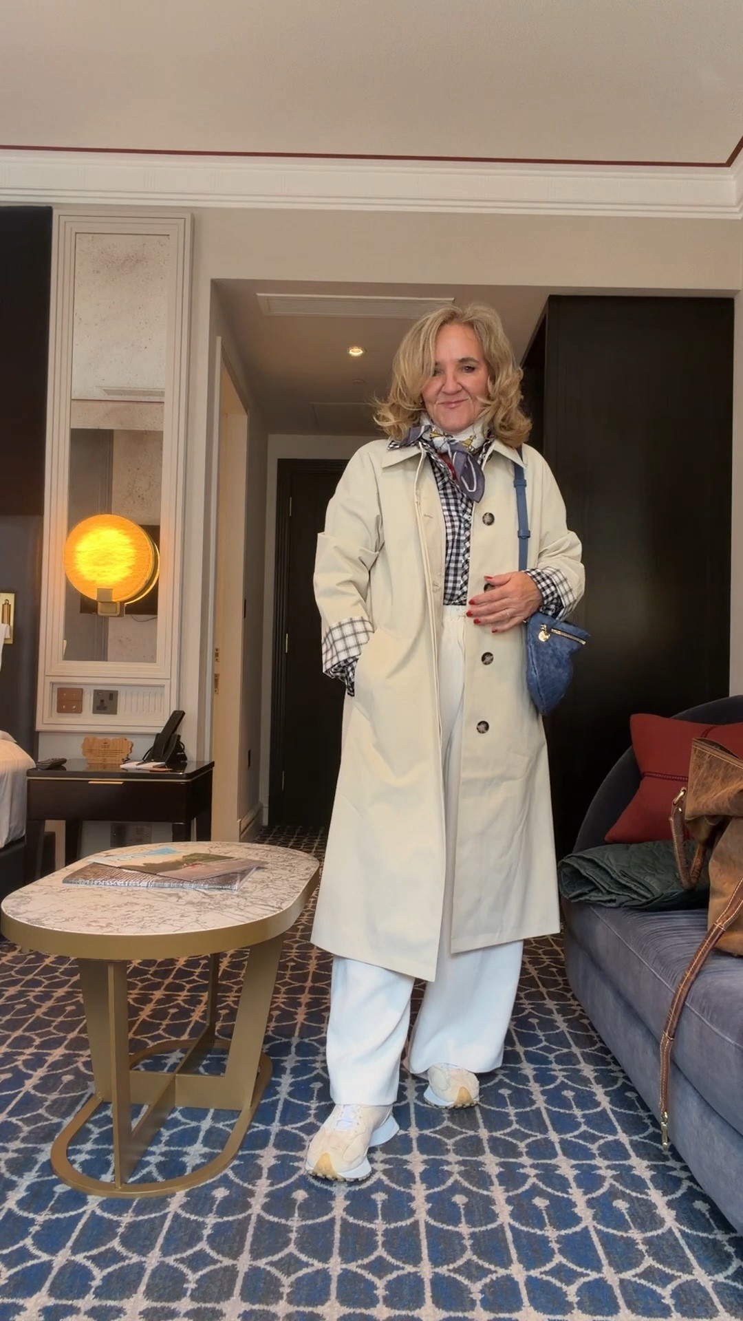 Traveling? I loved this touring outfit for London. My Mac raincoat is perfect for layering. I’m wearing a med oetite 
Pants are so wrinkle size med reg and had them hemmed 
Blouse medium 
Cashmere sweater was over my shoulders most of the time. But def needed it. Perfect look for temps in 50 low 60

#LTKOver40 #LTKootd #LTKTravel