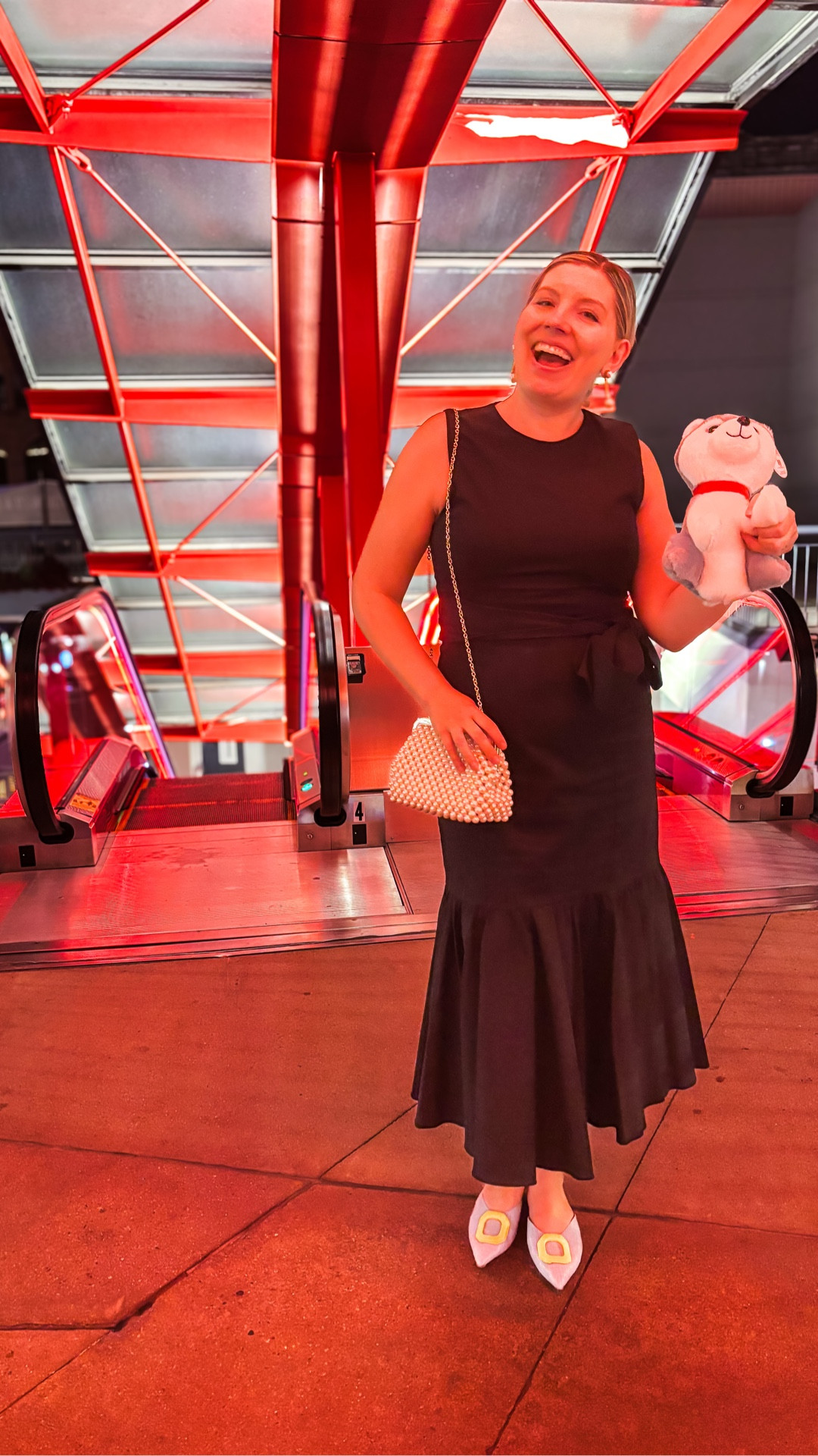 Look 18 - Main Street Muse 🎡 
A curated style series

💃✨ Anniversary date night, Main Street style ✨💃

This dress was too fabulous not to include in Main Street Muse - it’s part of a new collaboration at Dillard’s (full review is up now on my YouTube channel if you want all the details 💻). I wore it for our anniversary dinner at the end of last month, and not only is it an absolute standout style-wise, but it also turned out to be perfect for a post-dinner arcade adventure.

Between a dodgeball-themed game (where I fully schooled my husband 👊), the basketball hot shot game, skee ball, and of course my favorite - throwing balls at clowns 🎯- I felt stylish and comfortable the entire night (and was definitely the fanciest person there. Nice!). This was our first big date out after baby, and it was fabulous to just be together. Of course, we couldn’t resist using our arcade winnings to bring home a  stuffed animal for our little one -  he was on our minds the whole time (though we did manage to talk about a couple of things besides JUST how cute he is.) No lie, though, I texted my parents (who were babysitting for us) during dinner just to ask “what’s he doing now? Has he done anything new and cute?”)

🎡 About this capsule:
Each of my capsule collections is a two-week themed journey. Main Street Muse is about celebrating the final golden days of summer while leaning into the first notes of fall. It’s romantic, colorful, and nostalgic…like a small-town fair at sunset, filled with playful details, Americana charm, and the joy of the in-between season.

#MainStreetMuse #CapsuleCollection #AnniversaryDate #DillardsStyle #DillardsCollab #StatementDress #ArcadeDate #MomAndDadNightOut #SummerToFallStyle #RomanticStyle #WearableFashion #MainStreetStyle #EclecticStyle #FashionStorytelling #LTKstyle #LTKfashion

#LTKSeasonal #LTKStyleTip #LTKShoeCrush