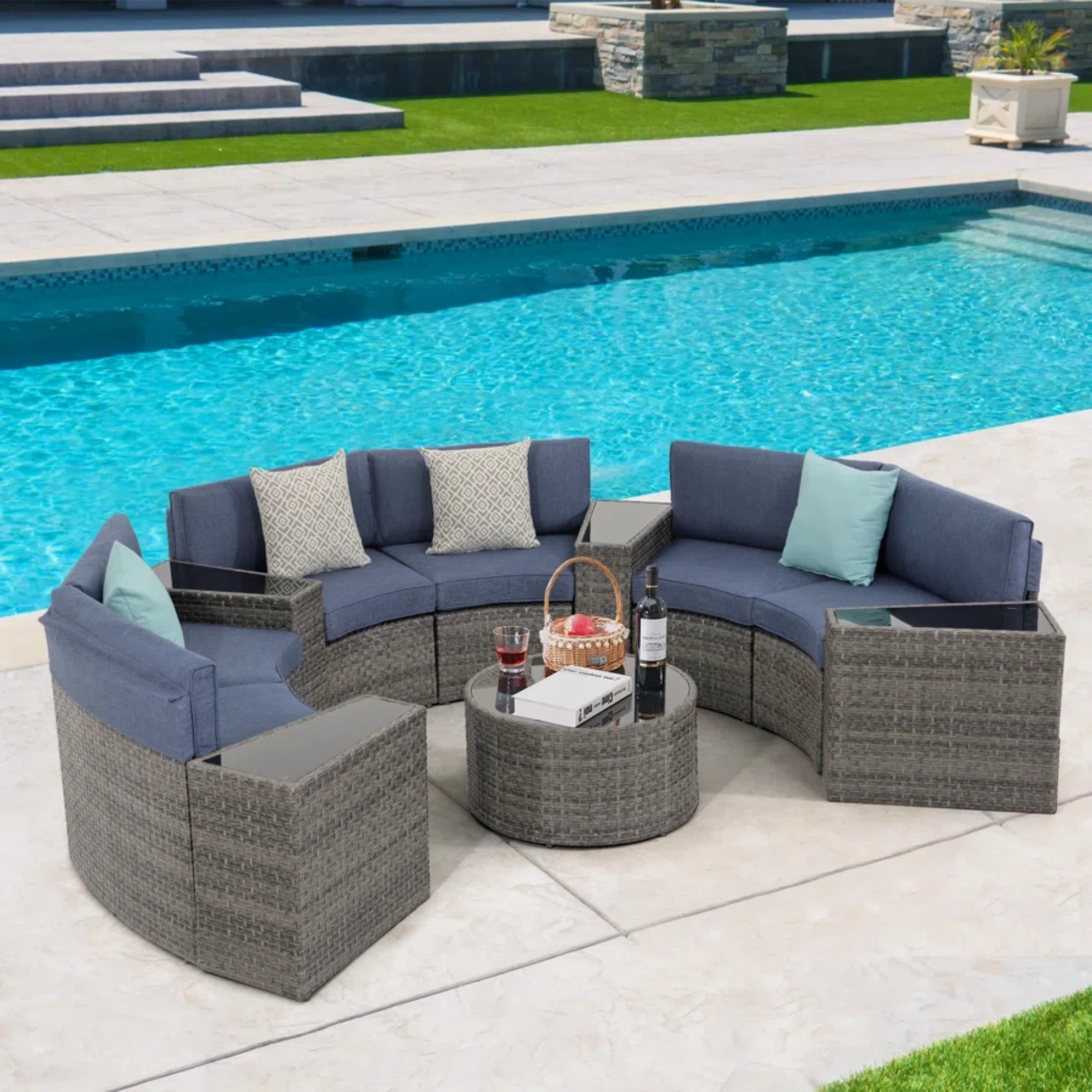 This 11-piece outdoor conversation set transforms your patio or deck into a welcoming retreat. With its modular design, you can easily rearrange the sofa, sectional, and chairs to fit your space and entertaining needs. Crafted from PE wicker with a steel frame, this set includes five tables topped with glass, offering plenty of room for drinks and snacks. ON SALE and under $1,400.

Keywords: Sectional, sofa set, patio set, outdoor patio set, C-shaped sofa set, conversation set, home refresh, patio refresh, wicker chair, outdoor sectional set, rattan sectional set  

#LTKSeasonal #LTKSaleAlert #LTKHome