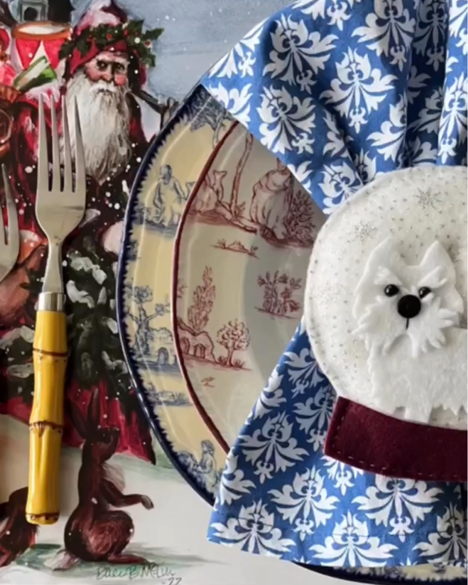 Why not use a Westie felt snowglobe ornament as a napkin ring? It adds the perfect holiday touch. Red and white and blue and white Wood and Sons toile de jouy plates layer with blue and white block print napkins and bamboo flatware. Several different felt Westies available plus other breeds too - Scottie, Schnauzer, Boston terrier, lab… etc!

#LTKSeasonal #LTKHoliday #LTKHome