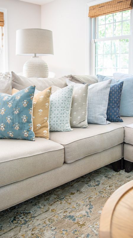 Give your living room, some color with decorative throw pillows. Coastal style home decor, white sofa,lamps.

#LTKfamily #LTKhome