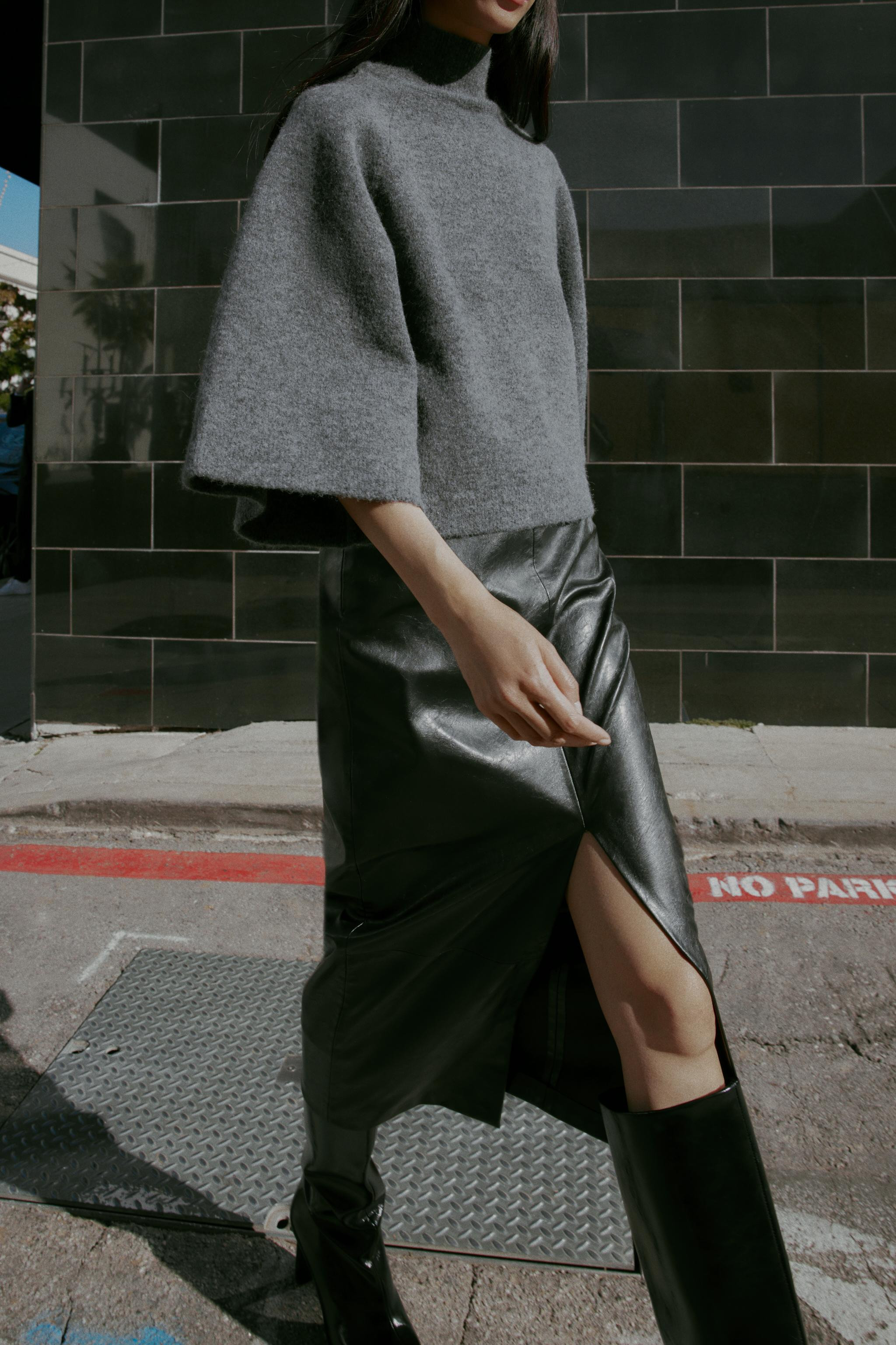 DescriptionColorContentsMeasurementsPlain knit jumper with high neck and wide sleeves. Ribbed tri... | Zara Canada