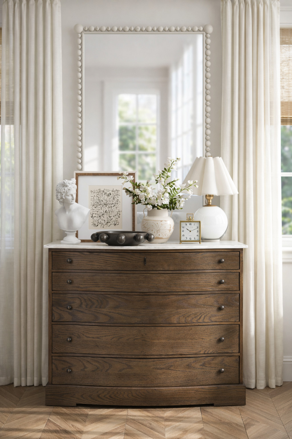This is how you turn a simple entryway into a moment ✨
Soft daylight, layered neutrals, and timeless textures come together to create an entry that feels calm, elevated, and intentional. From the warm wood dresser to the sculptural decor and classic beaded mirror, every detail works together to set the tone for the entire home.

If your entry feels “fine” but not finished, this is your sign to focus on balance, scale, and styling layers. A few well-chosen pieces can completely transform the first impression of your space 🤍

Save this for entryway inspo + tap to shop similar finds! 

 #LTKHome