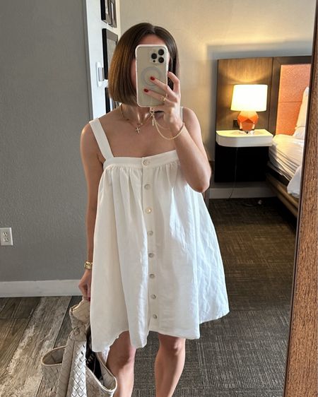 I love how light and airy this Revolve white dress is! I paired it with this satchel bag from Anthropologie for a casual sunny day look during the spring and summer! 

#LTKSeasonal #LTKstyletip #LTKitbag