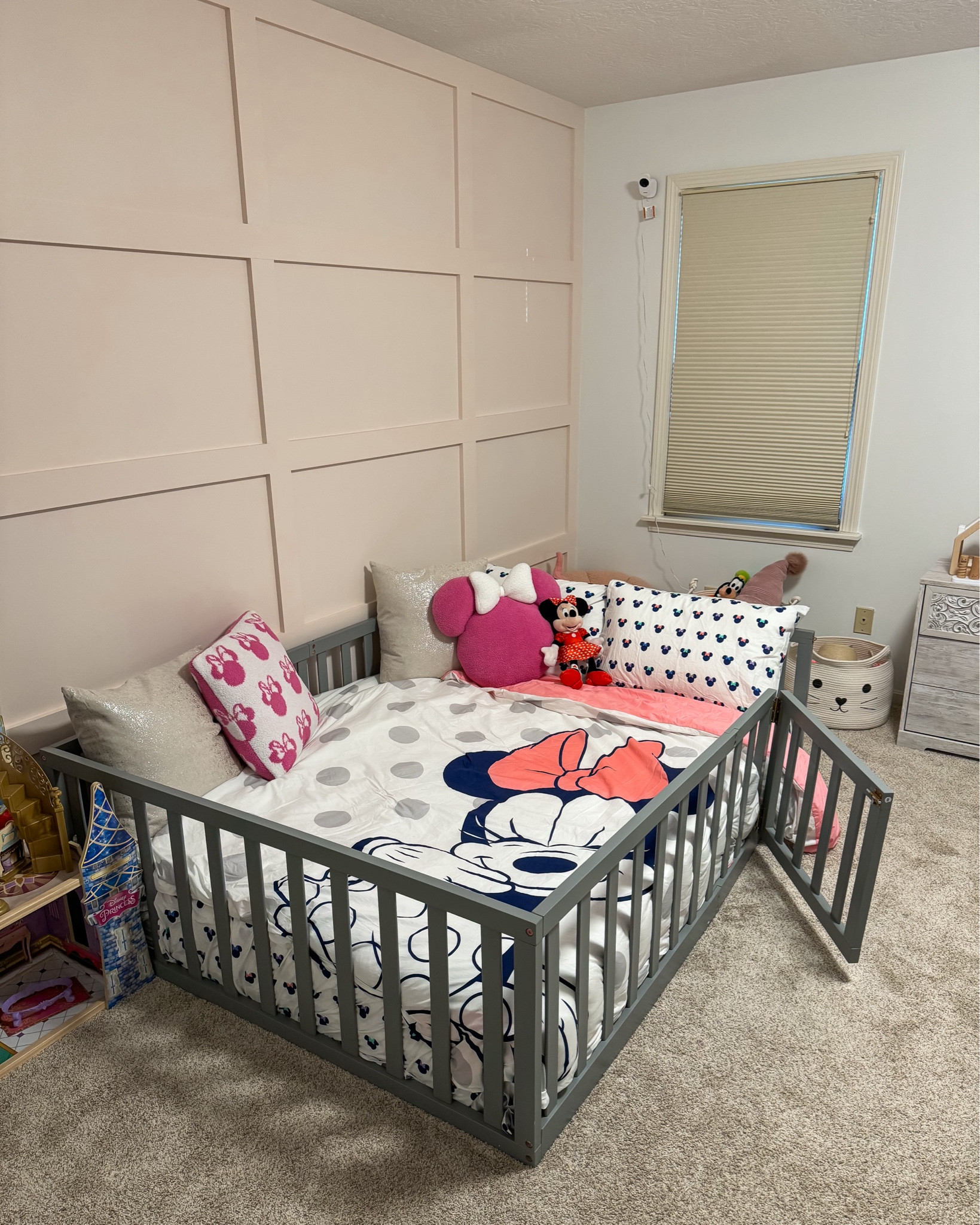 E loves her new floor bed and Minnie Mouse theme! She was so excited to get this set up! This is the FULL size floor bed. Toddler girl room. Kids room decor. Montessori floor bed. Minnie Mouse decor. Minnie Mouse bedding. Board and batten wall. Accent wall. Girls room decor. 

#LTKKids #LTKHome