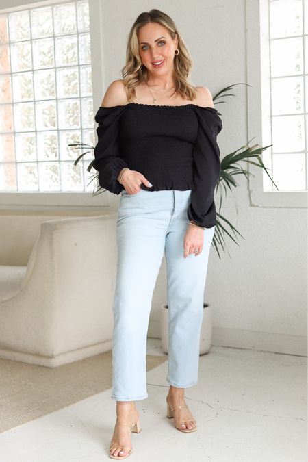 Amazon fashion basics I love - smocked puff sleeve blouse with Levi’s jeans and heels 

#LTKunder50