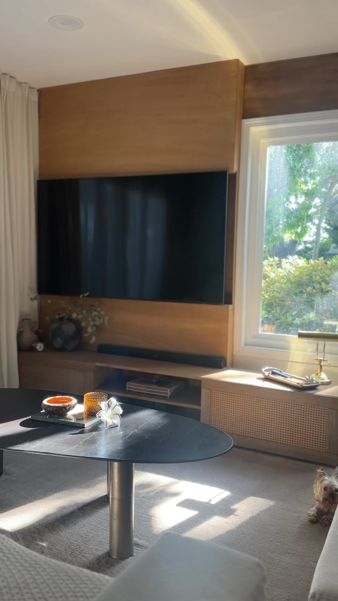 Our diy living room anchored by my favorite coffee table purchase ever! 