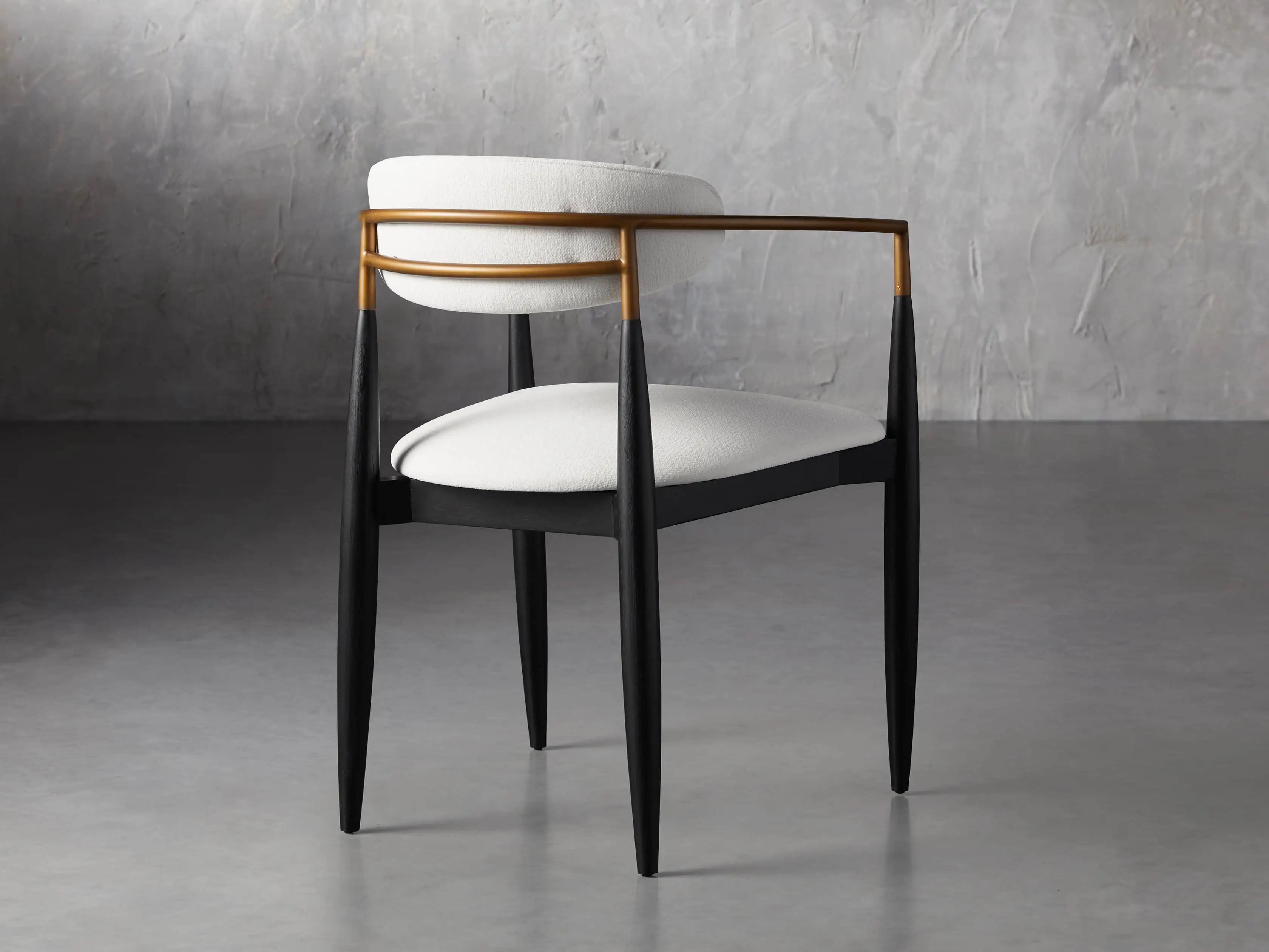 Jagger Dining Arm Chair in Black with Antique Brass | Arhaus