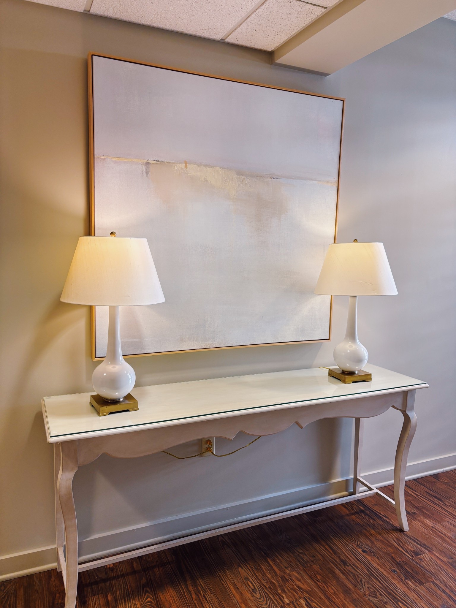 ✨ Neutral entryway perfection ✨
Loving how this oversized artwork and matching lamps create the softest, most welcoming glow. The curved console table + warm wood floors = the perfect mix of classic and modern. 🤍

Shop my entryway favorites — neutral decor, statement art, and timeless lighting pieces that make any space feel elevated.
#LTKHome #EntrywayDecor #NeutralHome #HomeInspo #ConsoleTableStyle #CozyChic #InteriorDesign #StyledSpace

#LTKmomlife #LTKHome #LTKSaleAlert