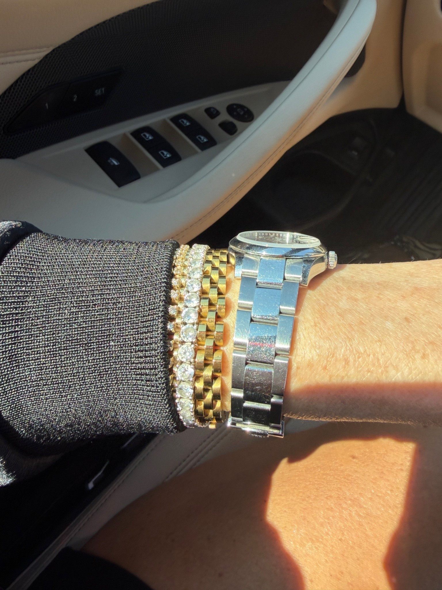 Bracelet stack lately: Bennett bracelet electric picks, tennis bracelet Walmart, other diamond bracelet and watch several years old

#LTKOver40